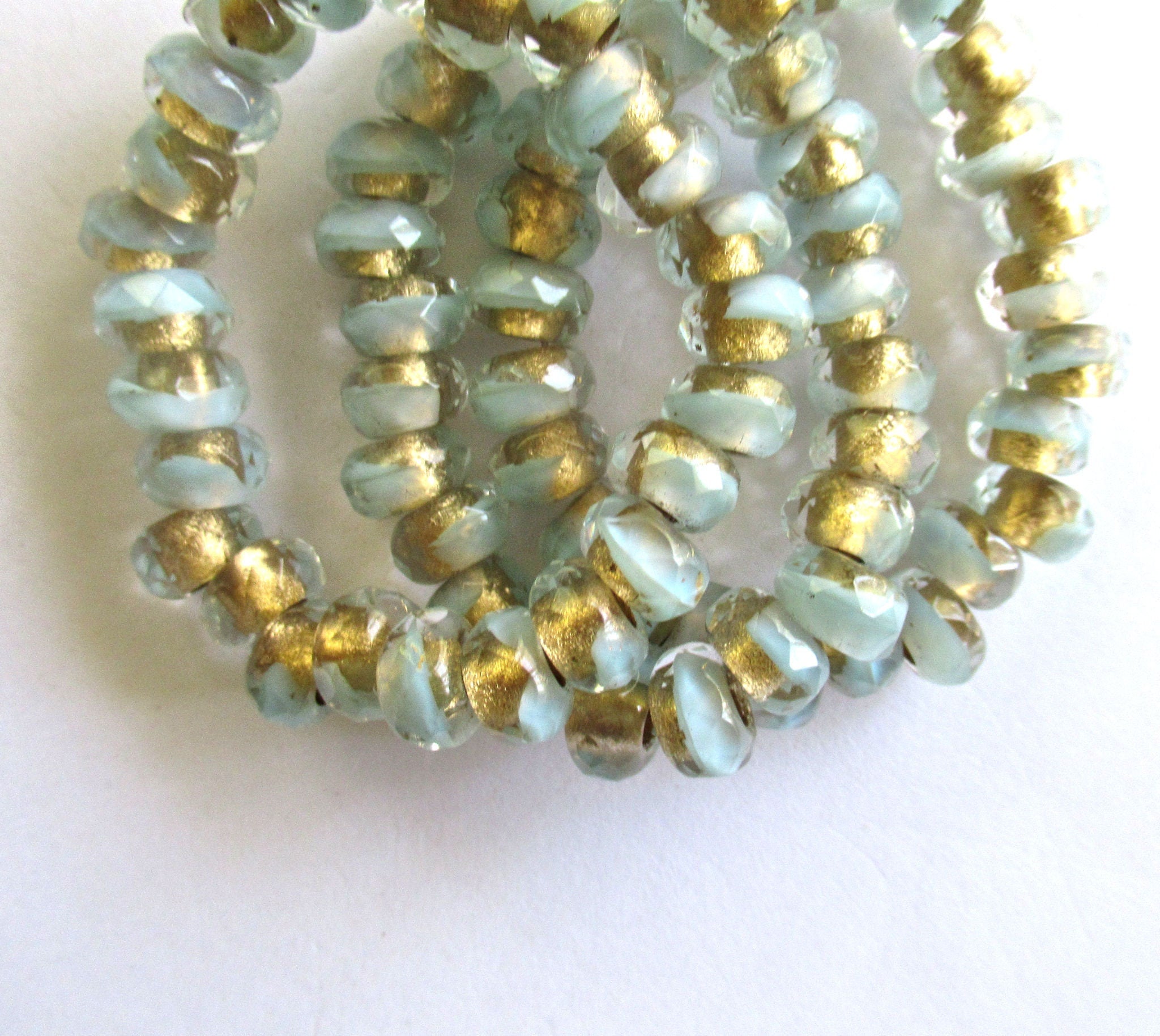 Ten Czech glass roller beads - 6 x 9mm light pastel green, crystal, gold lined, faceted roller, rondelle, big 3.5mm hole beads C00801