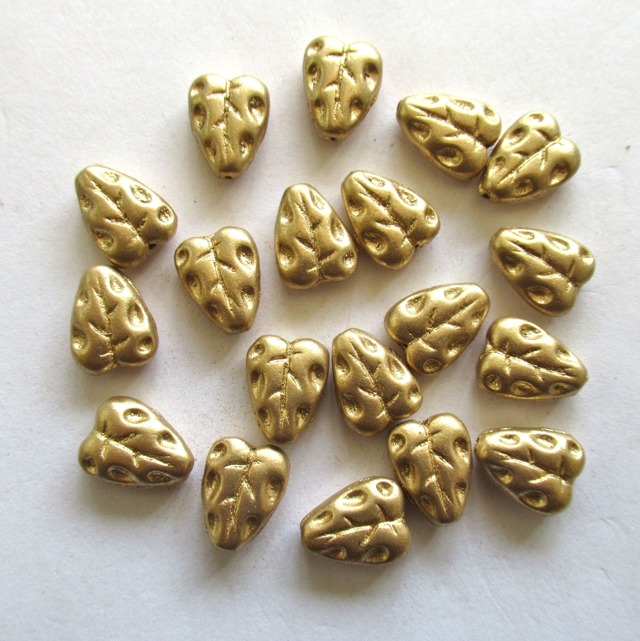 20 Czech glass leaf beads - 12 x 9mm matte metallic gold textured center drilled leaves - C00801