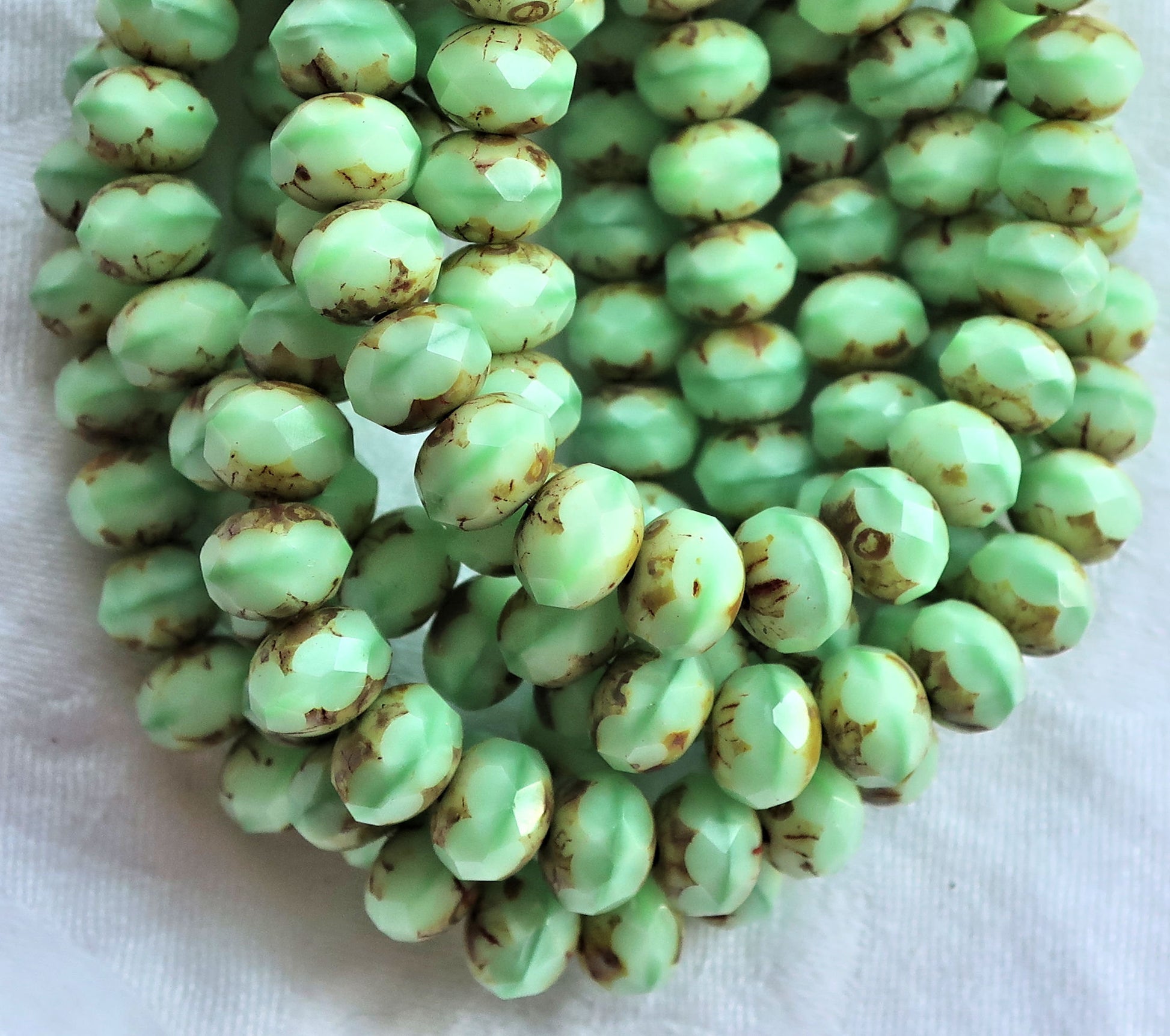Lot of 25 Opaque Mint Green Picasso faceted puffy rondelle or donut beads, 8 x 6mm green Czech glass beads C07201 - Glorious Glass Beads