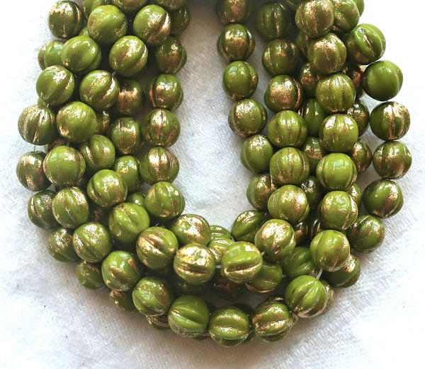 25 Czech pressed glass melon beads. 6mm Avocado Green with gold accents, C00101