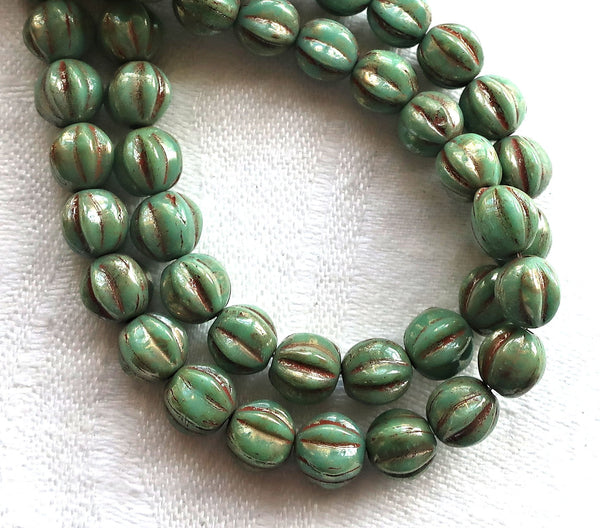 Lot of 25 6mm pressed Czech glass melon beads, pea green picasso beads with coral accents C0901