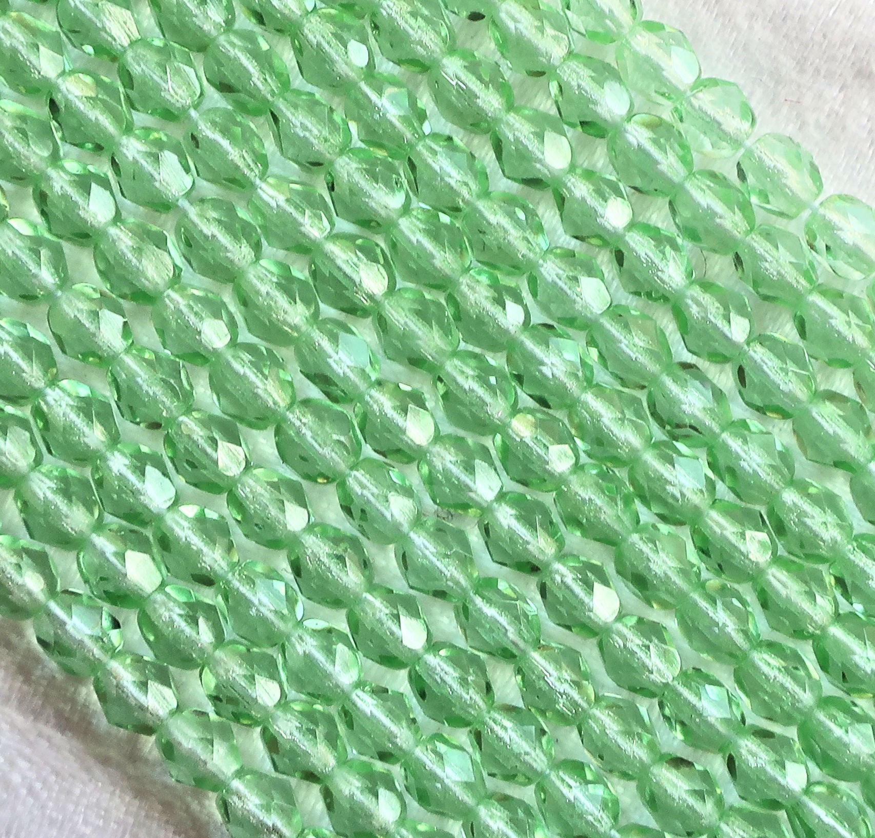 Lot of 50 4mm Peridot, light green Czech glass beads, firepolished faceted round glass beads C2501 - Glorious Glass Beads