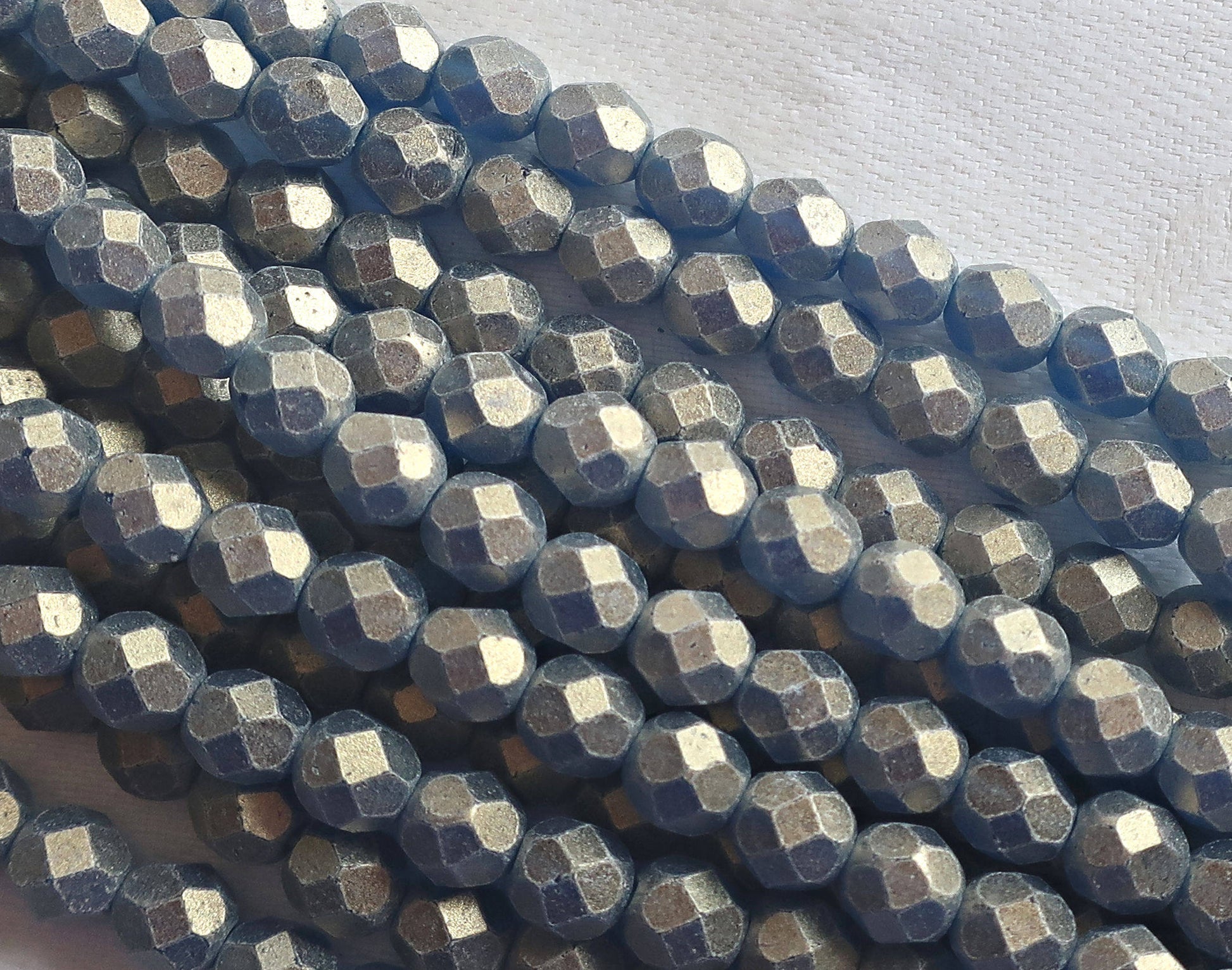 Lot of 25 6mm Sueded Gold Capri Blue Czech glass beads, firepolished, faceted round beads, with a frosty gold finish , C2525 - Glorious Glass Beads