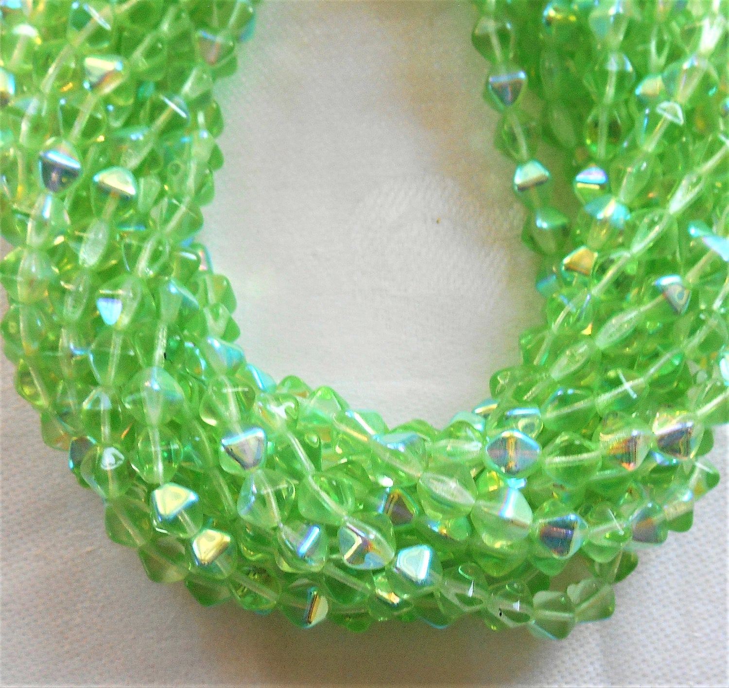 Lot of 50 6mm Peridot Green AB bicones, pressed glass Czech bicone beads, C2750 - Glorious Glass Beads