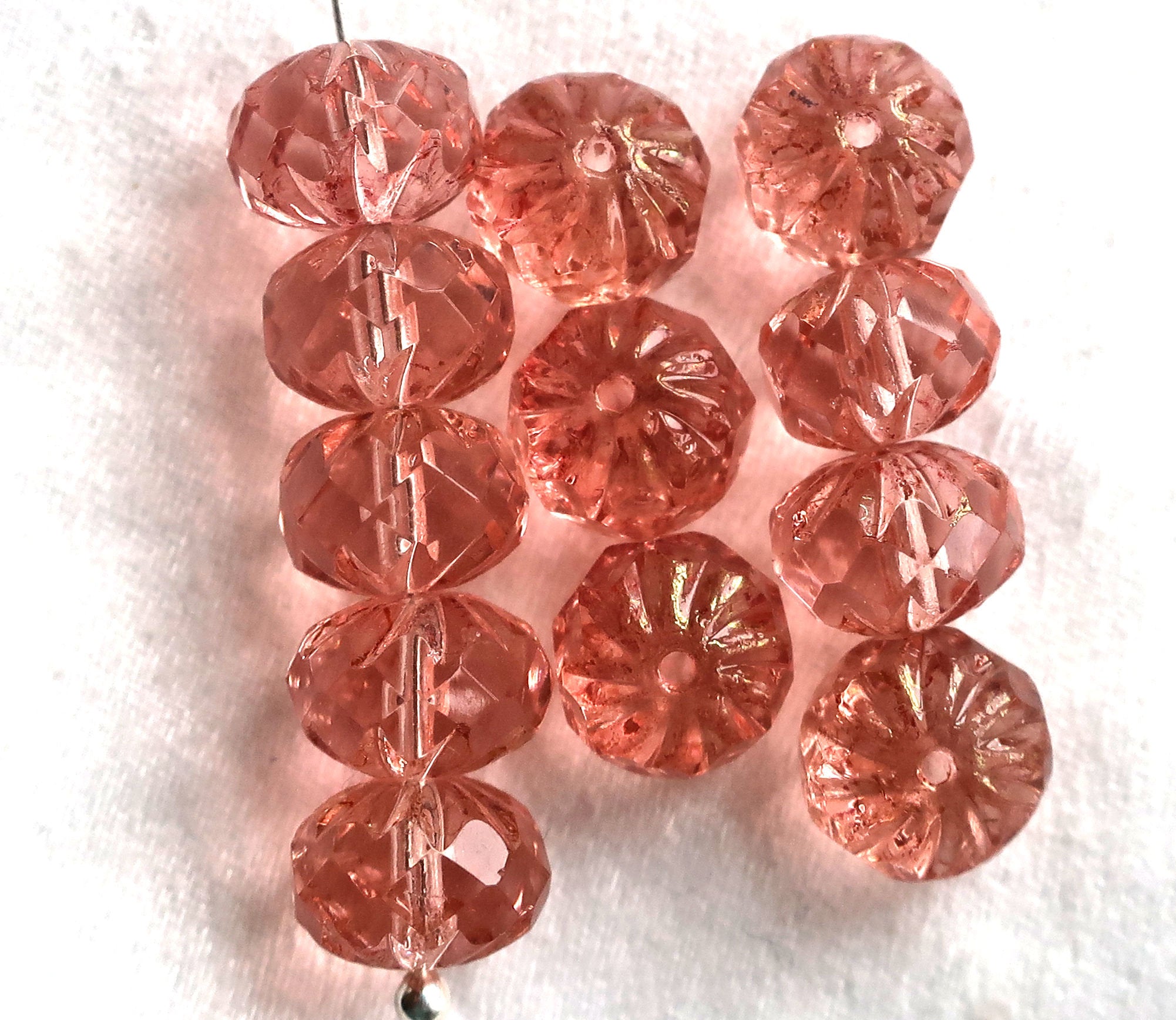 Ten Czech glass faceted, carved cruller beads, 7 x 10mm transparent rosaline pink rondelles, sale price 9801 - Glorious Glass Beads