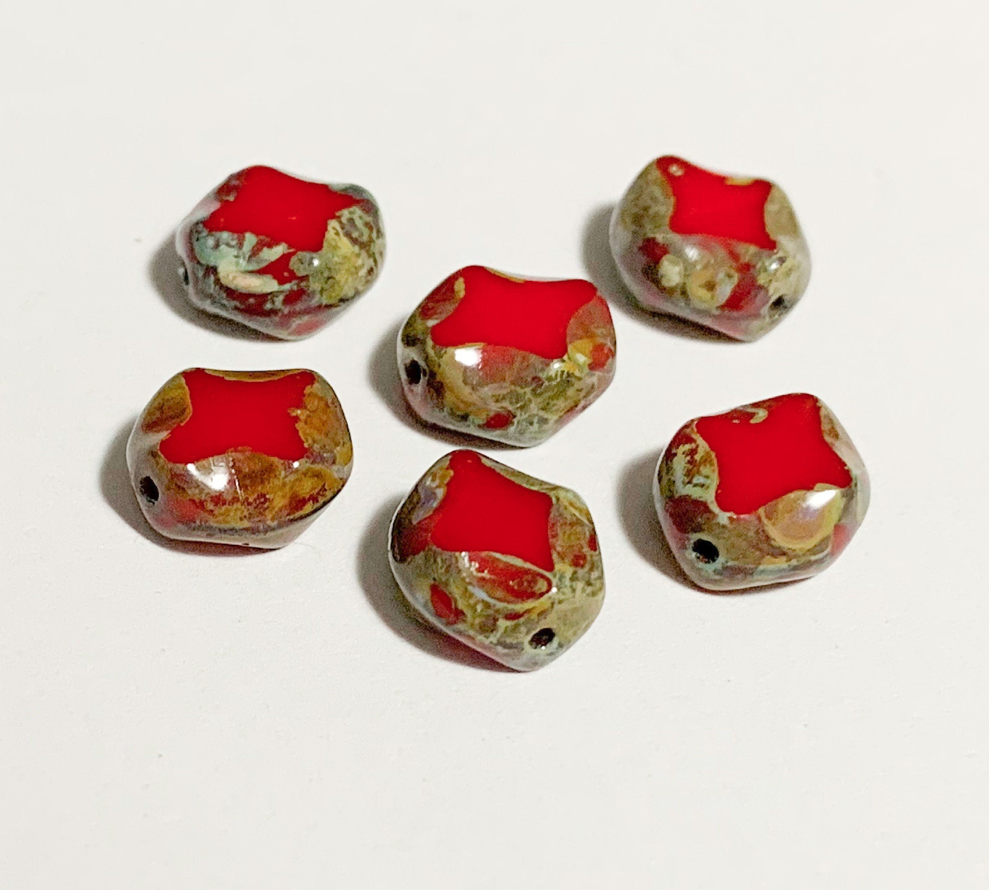 15 Czech glass oval beads - 9 x 8mm red oval with a Picasso finish - carved table cut with a diamond pattern beads C0571