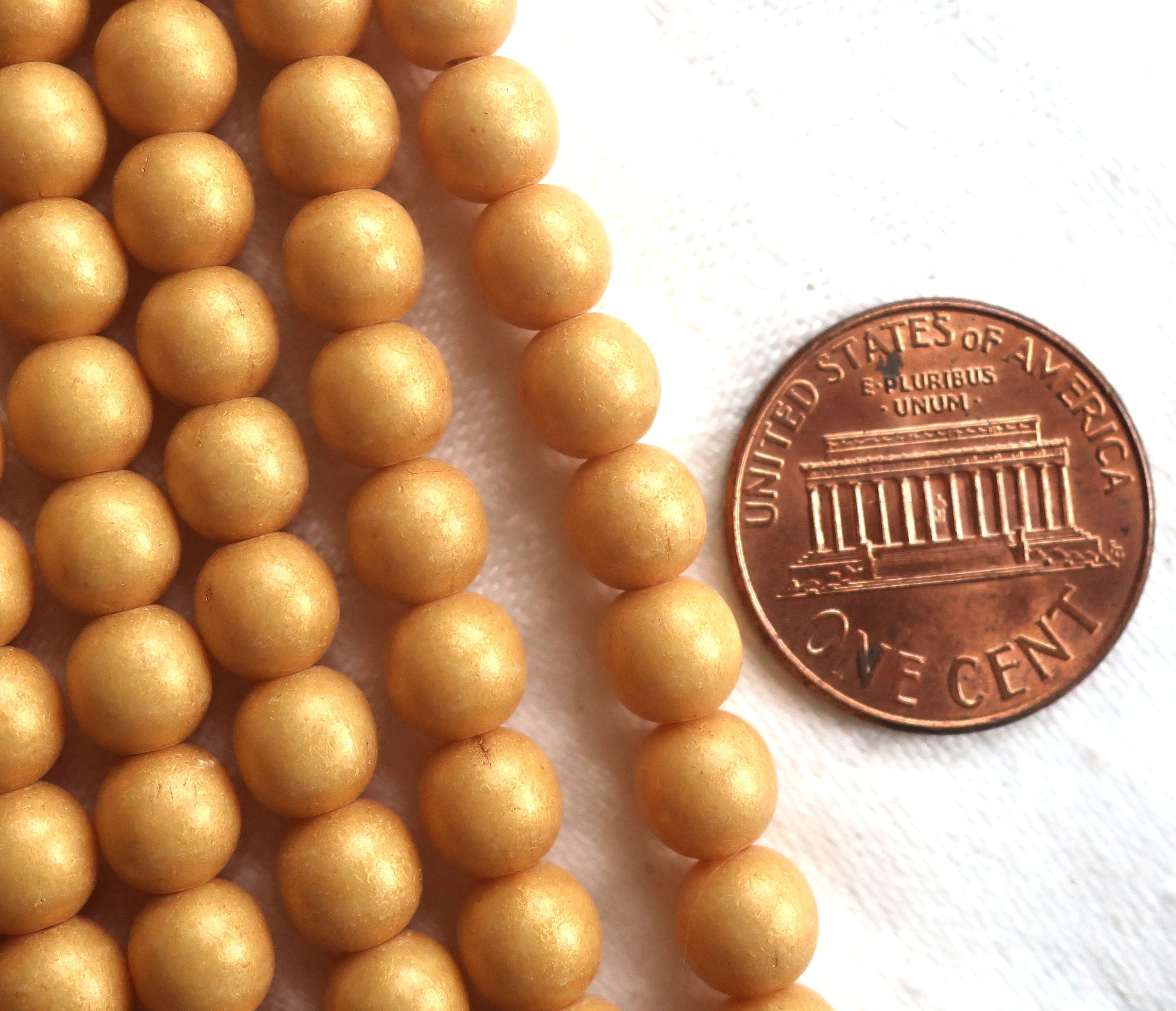 Lot of 50 6mm Czech glass druks, opaque beige, light brown, Pacifica Ginger smooth round druk beads 03150 - Glorious Glass Beads