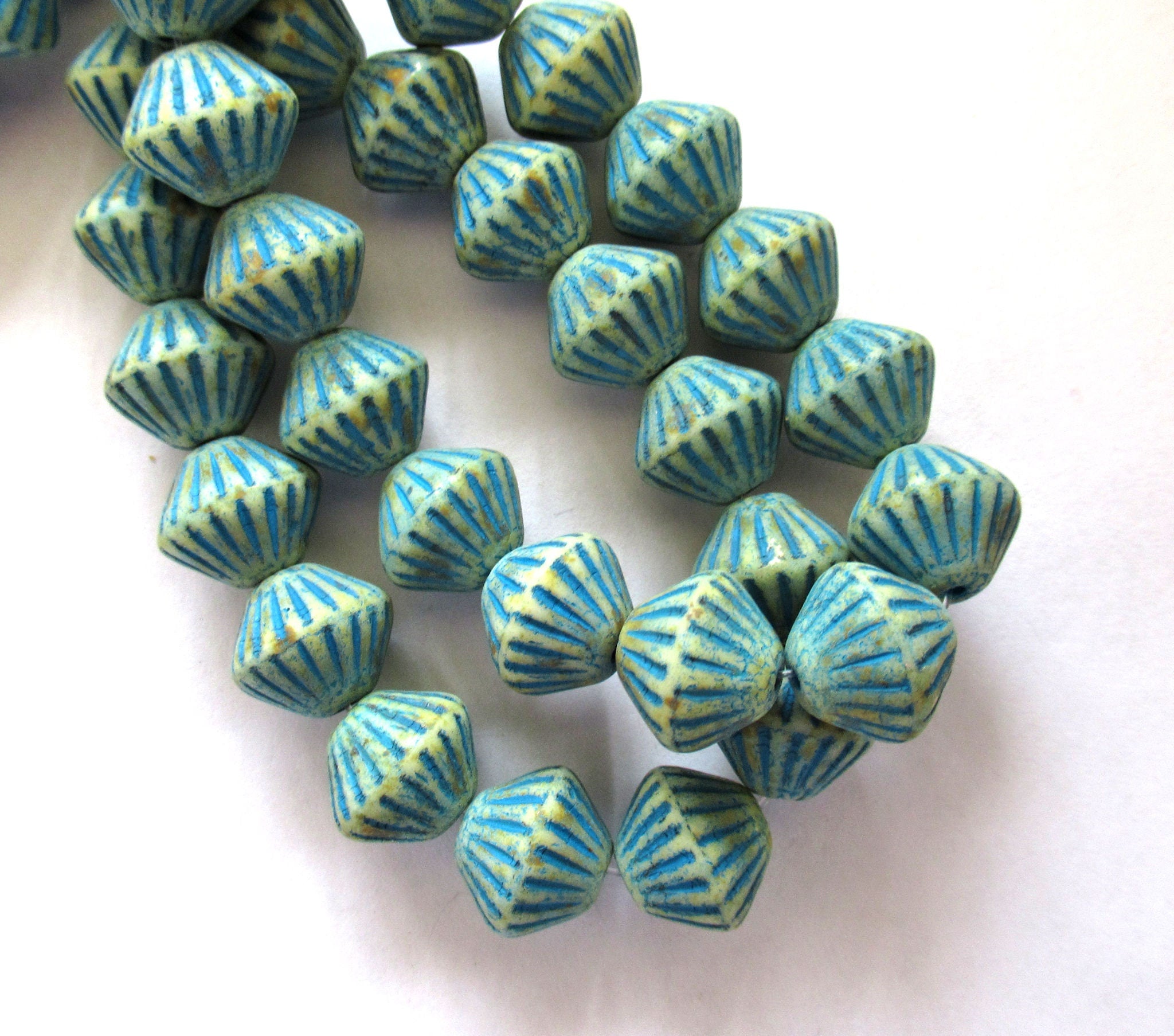 Five Czech glass bicones - 11mm x 10mm - opaque off white with a turquoise blue wash - carved, chunky, rustic bicone beads C0065