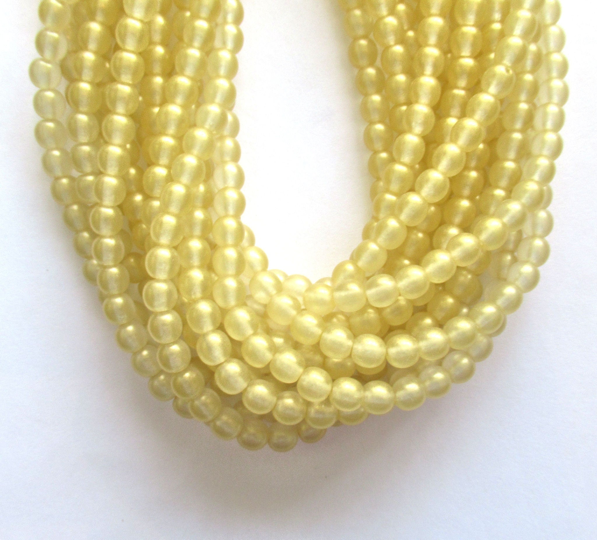 Lot of fifty 6mm Czech glass smooth round druk beads - gold lame druks - C0098