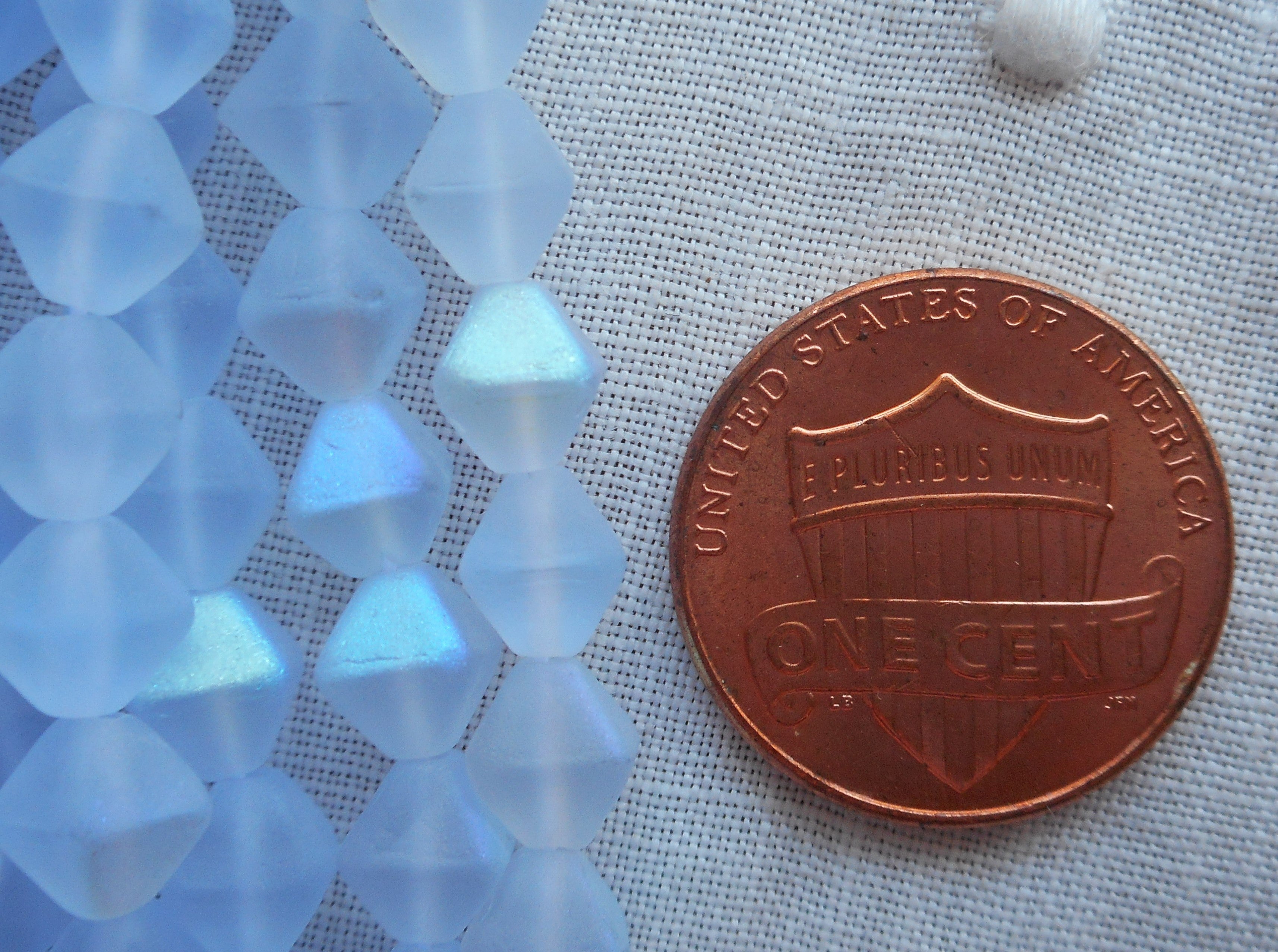 Fifty 6mm Matte Light Sapphire AB bicones, Iridescent blue pressed Czech glass bicone beads C8601