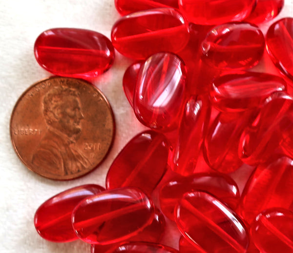 Lot o 25 transparent Siam Red slightly twisted oval Czech Glass beads, 14mm x 8mm pressed glass beads C0425 - Glorious Glass Beads