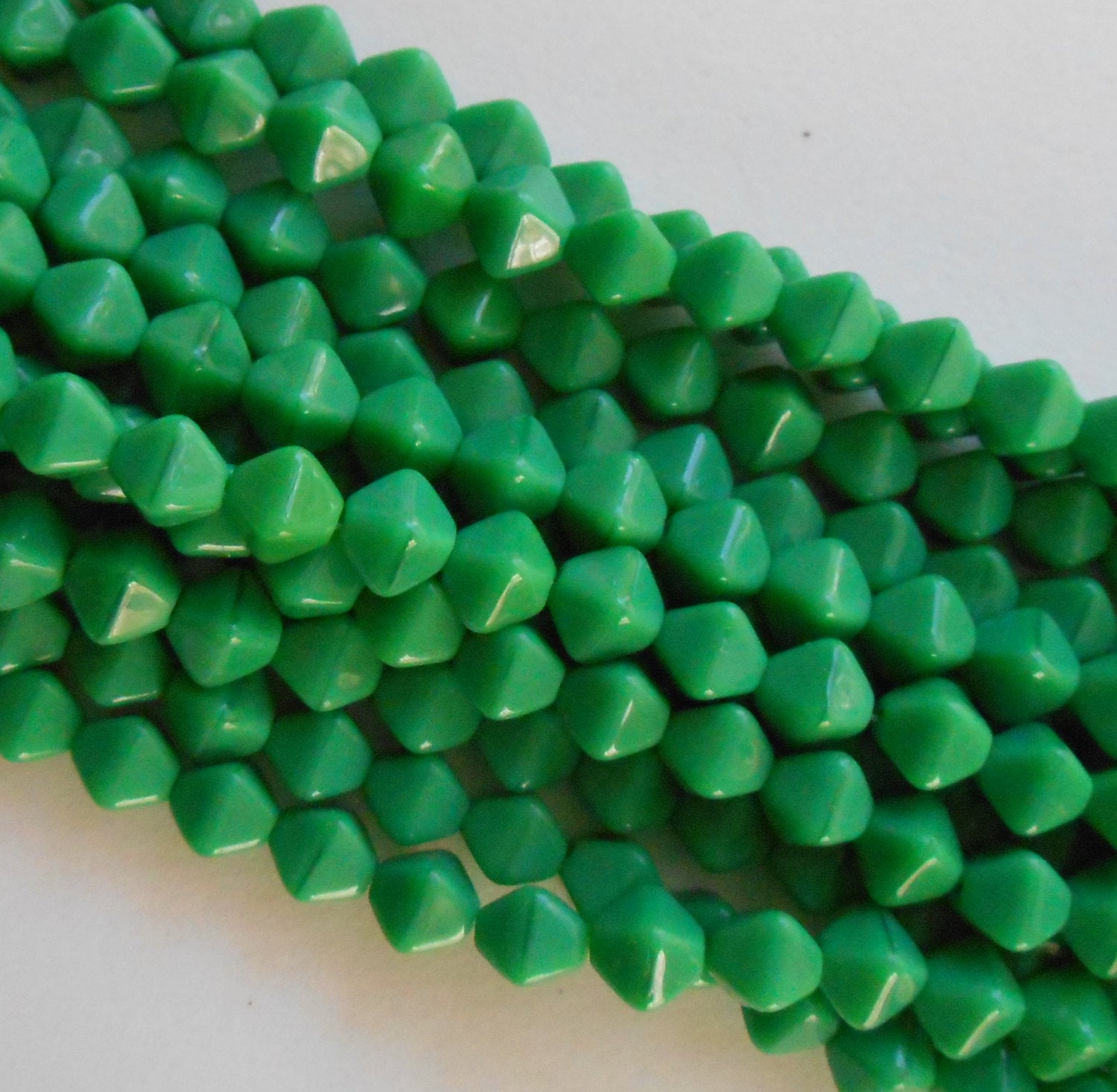 50 6mm Opaque Green bicone pressed glass Czech beads, C8650