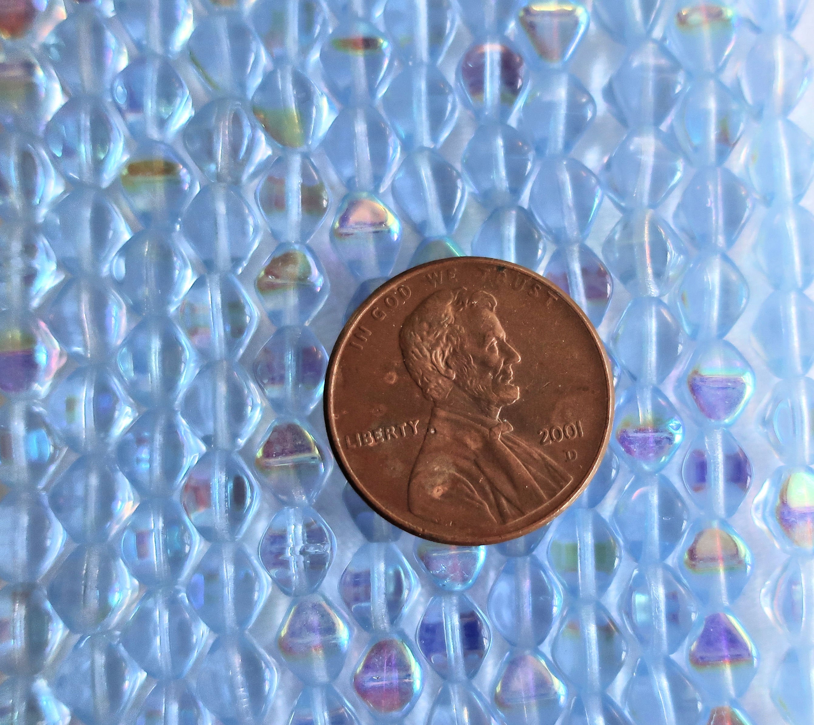 Fifty 6mm Light Sapphire AB bicones, Iridescent blue pressed Czech glass bicone beads C9701 - Glorious Glass Beads