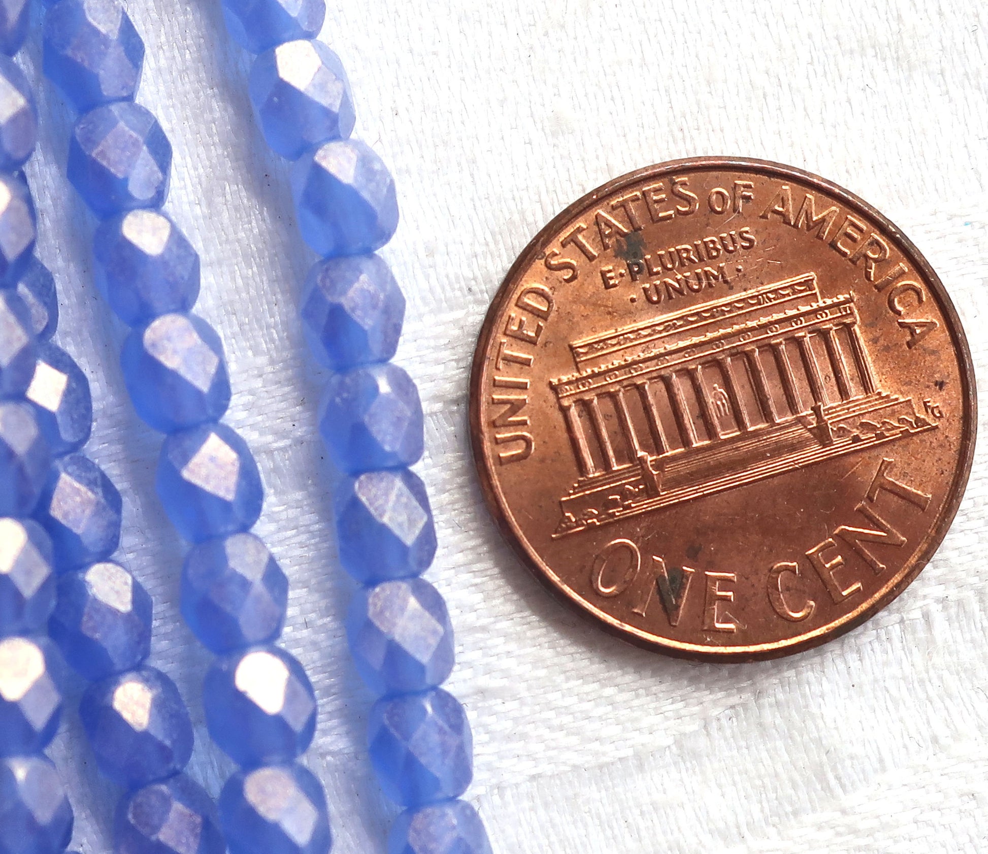 Lot of 50 4mm Czech glass beads, Sueded Gold Sapphire Blue firepolished, faceted beads. with a golden finish C9601 - Glorious Glass Beads