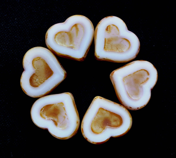 Five Czech glass heart beads; 14 x 12mm table cut, carved, opaque white glass hearts with a picasso finish C6906