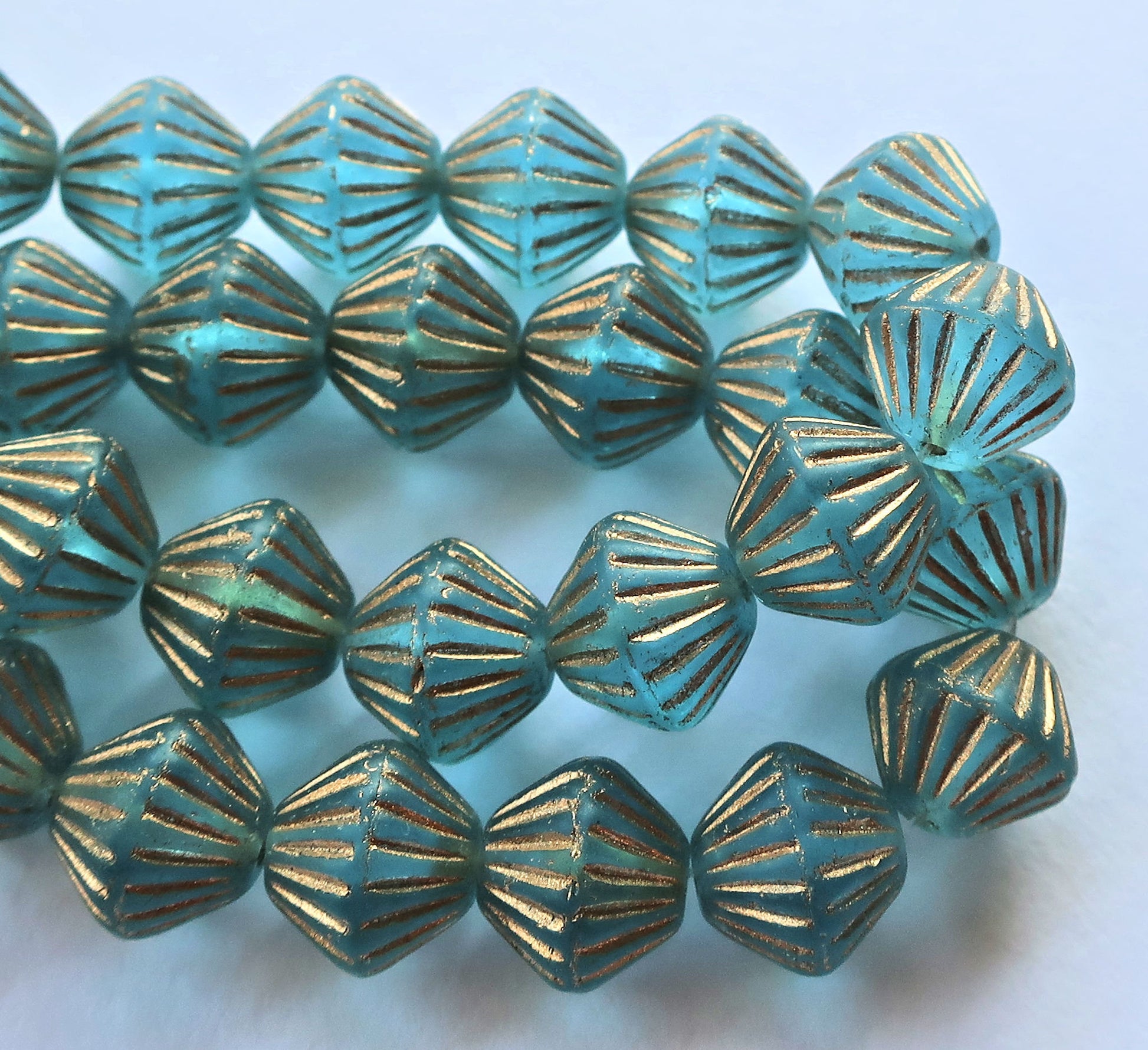 Five Czech glass bicones - 11mm x 10mm - frosted light sapphire blue with gold accents - carved, chunky, rustic bicone beads C0601 - Glorious Glass Beads