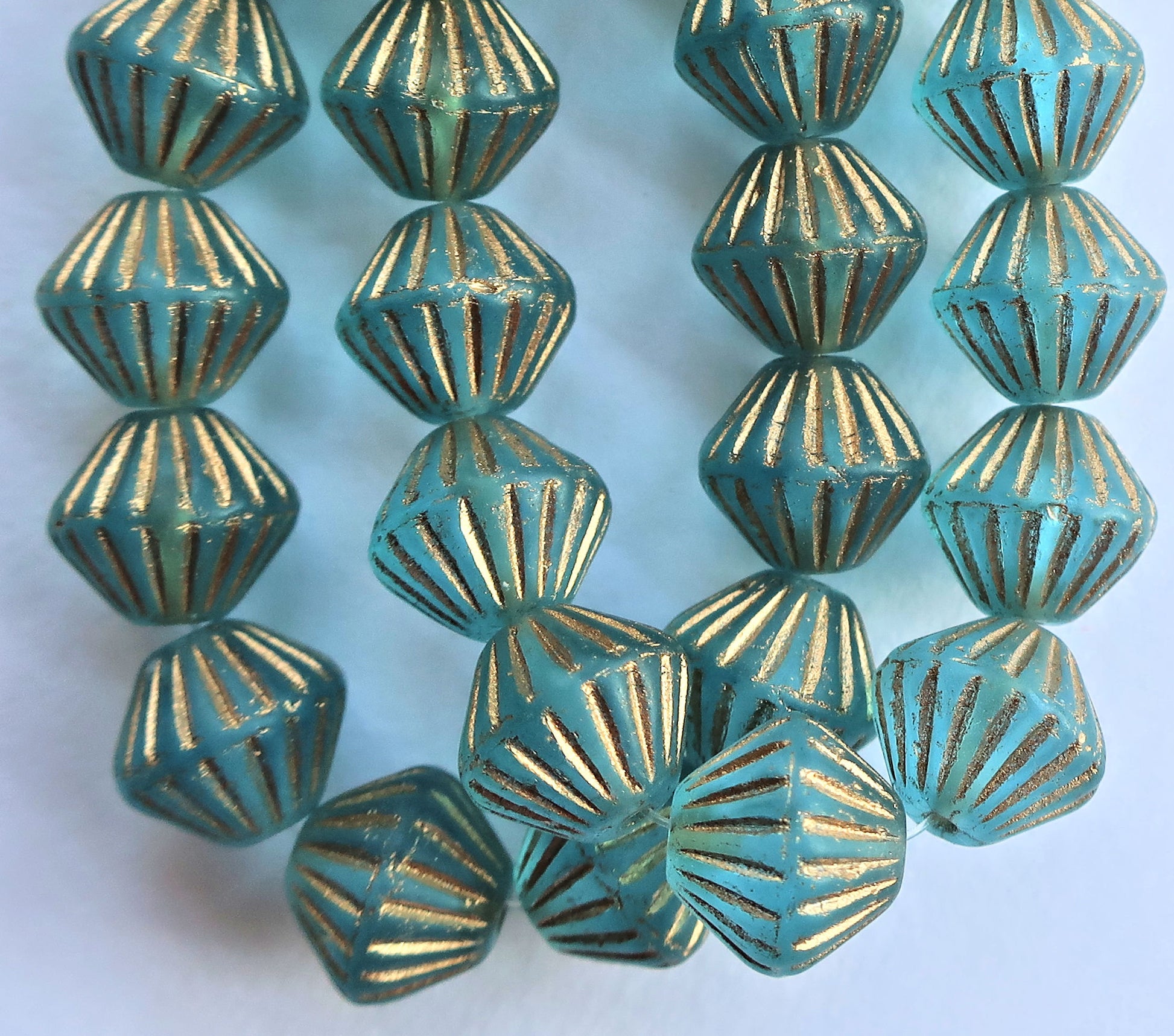 Five Czech glass bicones - 11mm x 10mm - frosted light sapphire blue with gold accents - carved, chunky, rustic bicone beads C0601 - Glorious Glass Beads