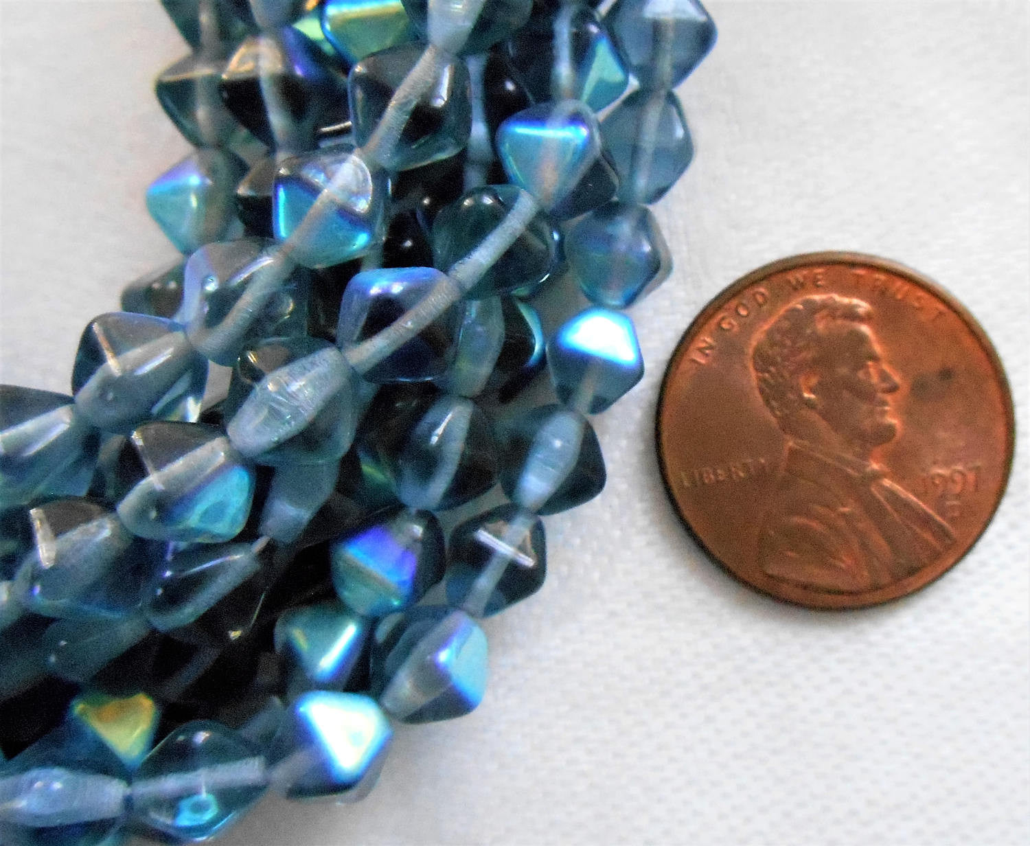 Lot of 50 6mm Montana Blue AB bicones, pressed Czech glass bicone beads, C2750 - Glorious Glass Beads