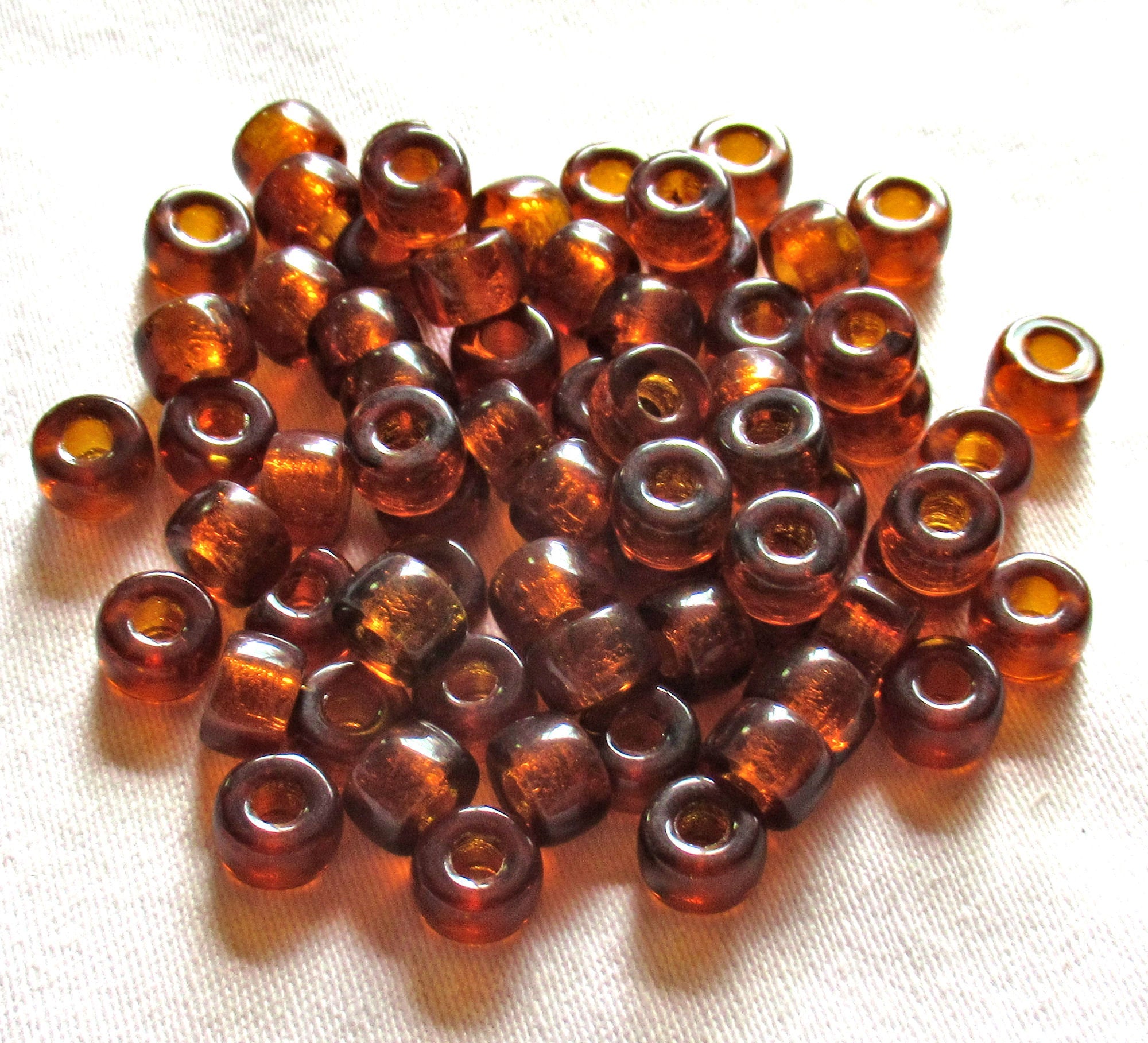lot of 25 9mm Czech glass pony or roller beads - madera topaz large hole crow beads,