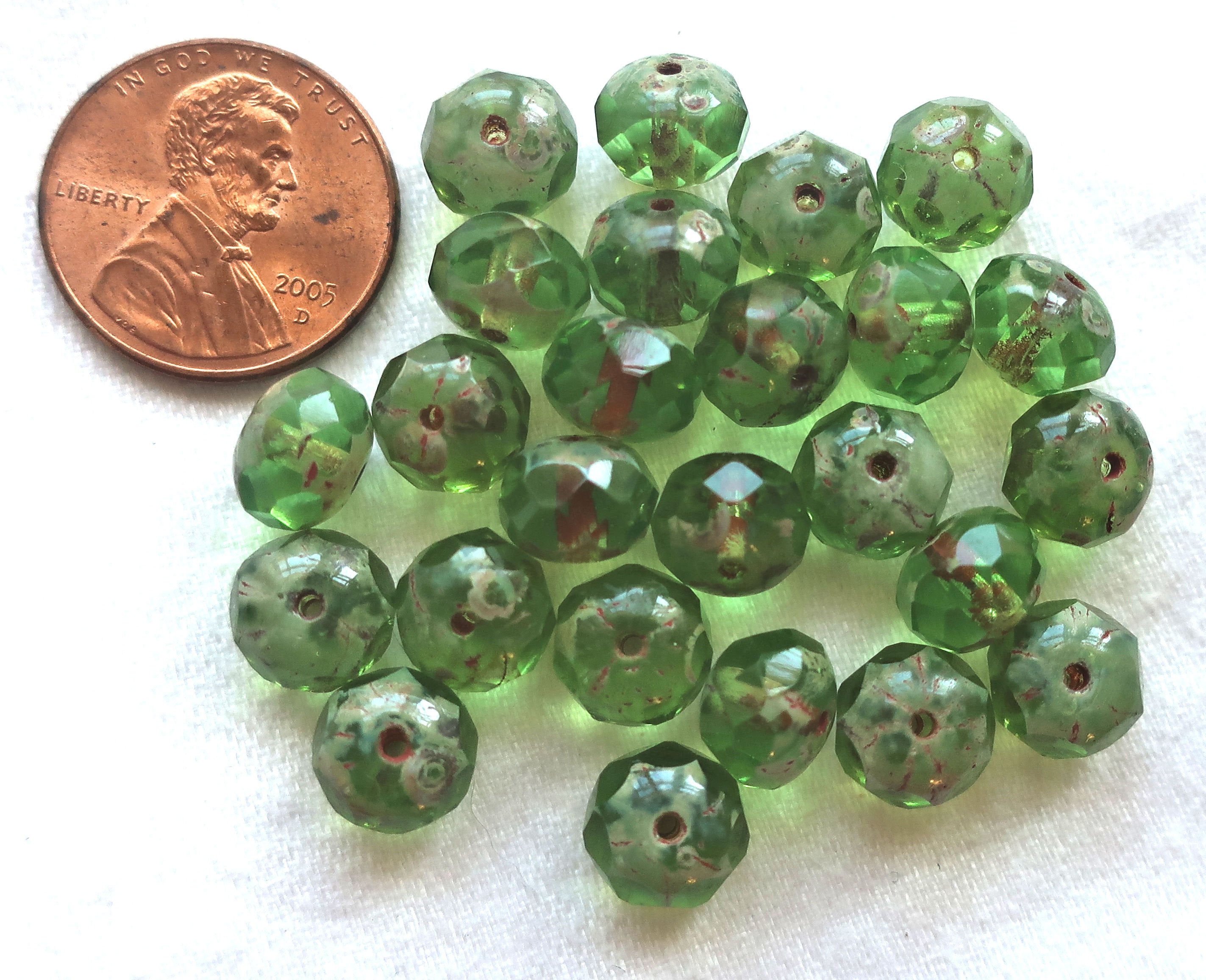 25 faceted Czech glass puffy rondelle beads, 8 x 6mm transparent peridot green picasso rondelles on sale 80101 - Glorious Glass Beads