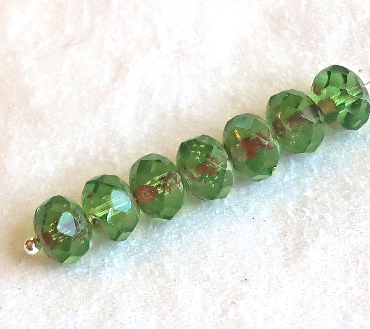25 faceted Czech glass puffy rondelle beads, 8 x 6mm transparent peridot green picasso rondelles on sale 80101 - Glorious Glass Beads