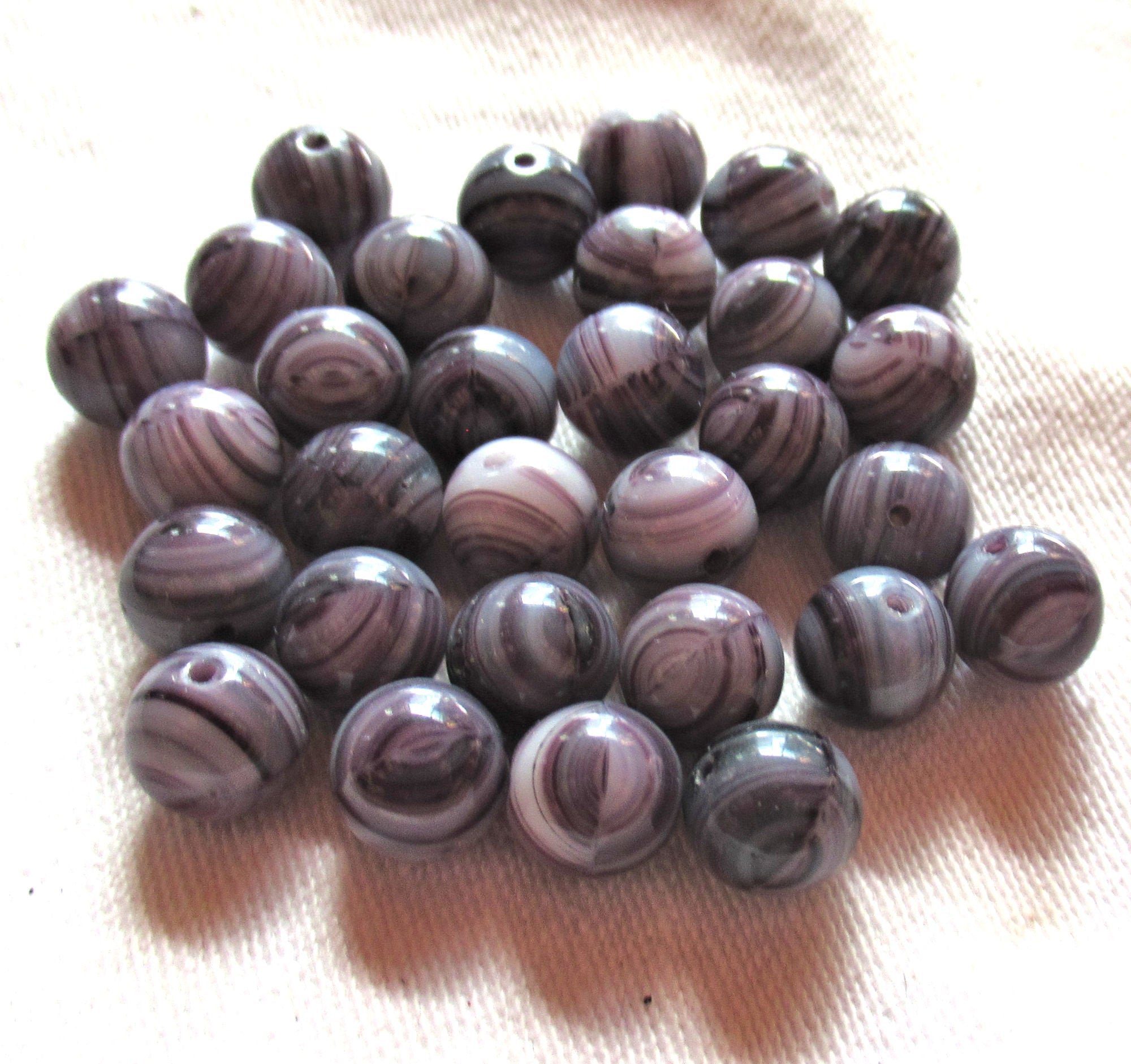 Lot of 25 8mm Czech glass druks - opaque amethyst or purple and white swirled glass - smooth round druk beads