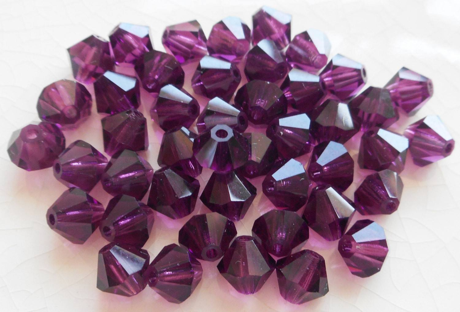 Lot of 24 6mm Amethyst Czech Preciosa Crystal bicone beads, faceted glass purple bicones C4801 - Glorious Glass Beads