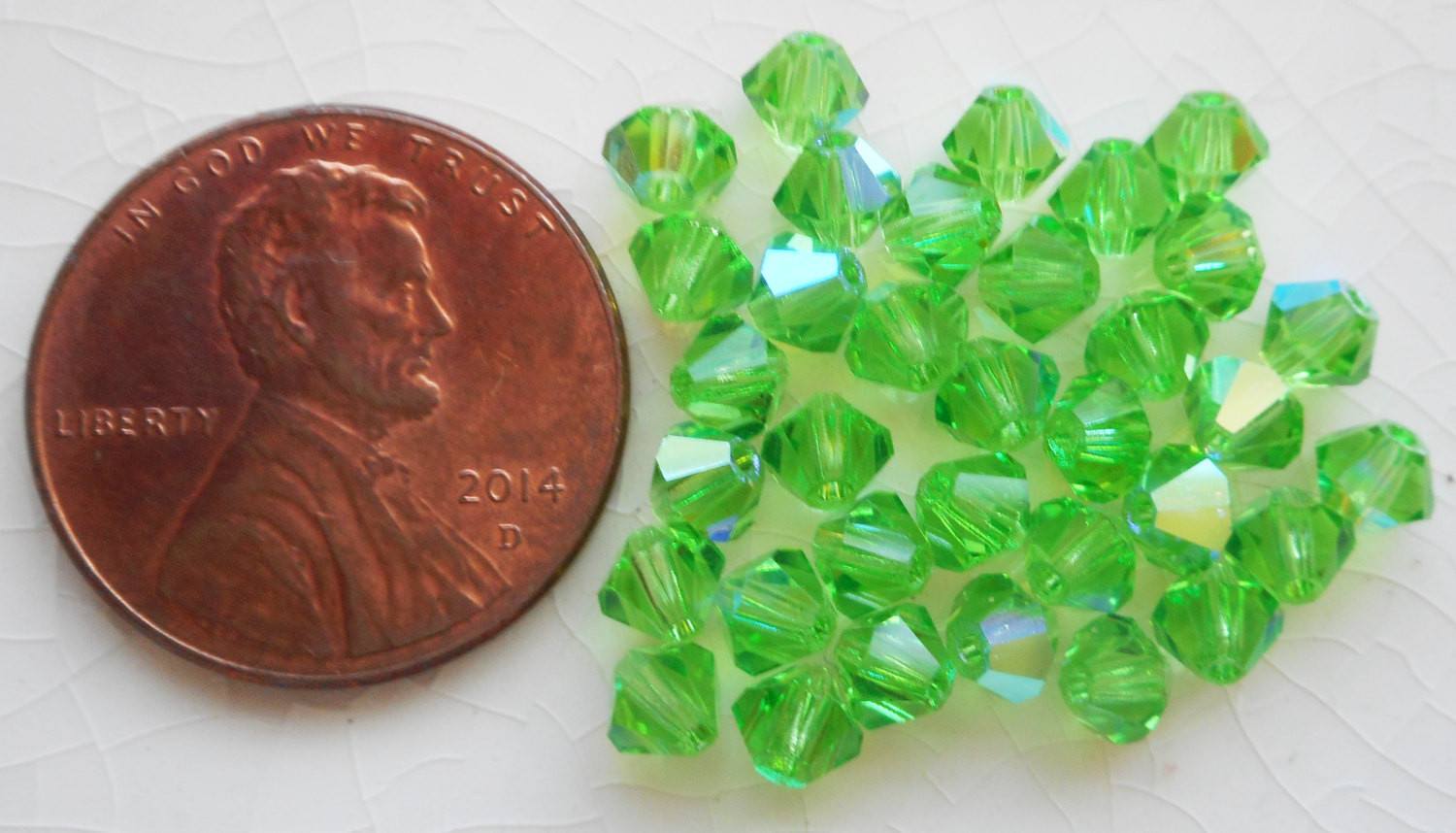Lot of 24 4mm Czech Peridot AB glass faceted bicone beads, Preciosa Green AB bicones 5601 - Glorious Glass Beads