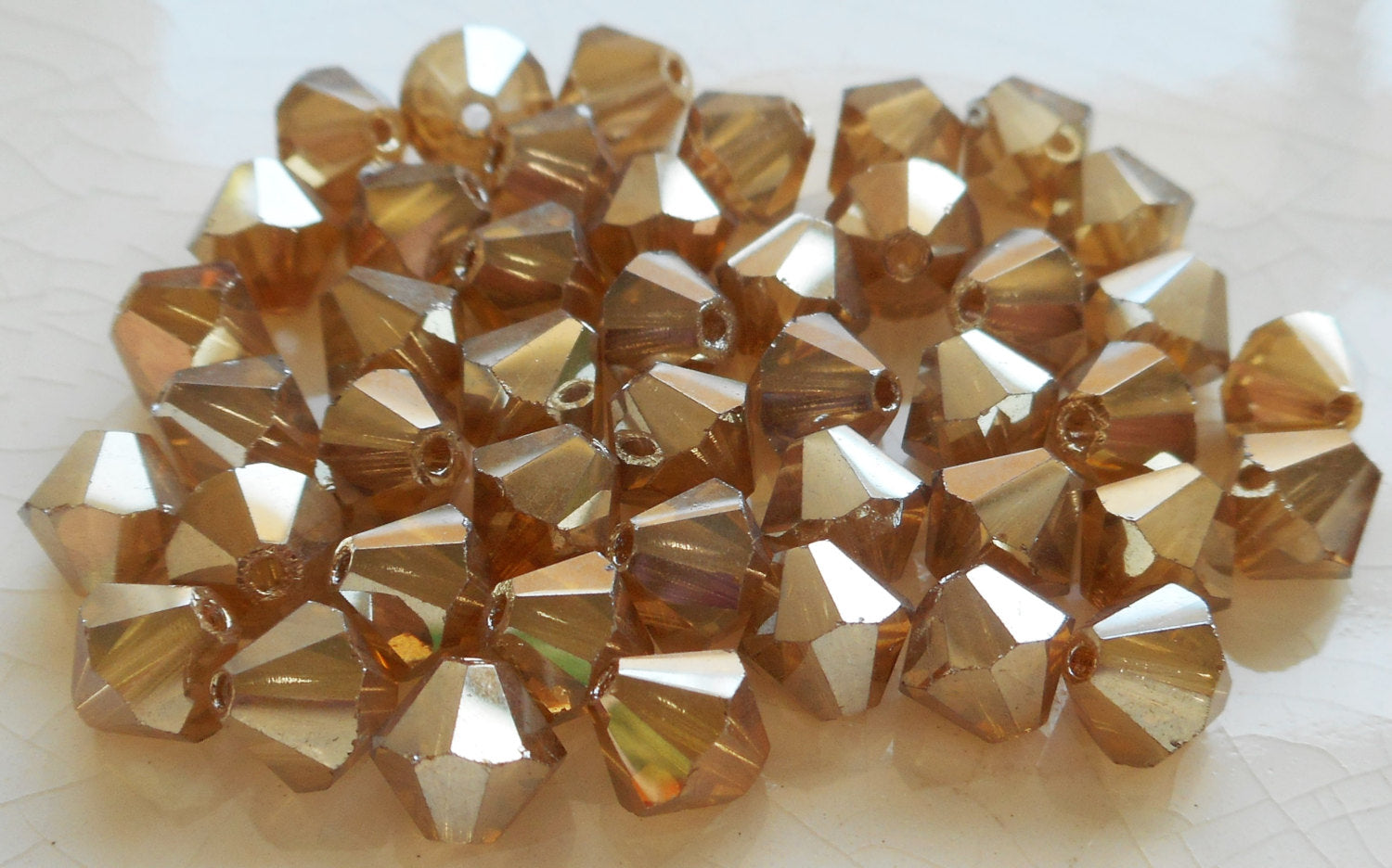 Lot of 24 6mm Light Golden Flare Gold Metallic Czech Preciosa Crystal bicone beads, faceted gold glass bicones C7801 - Glorious Glass Beads
