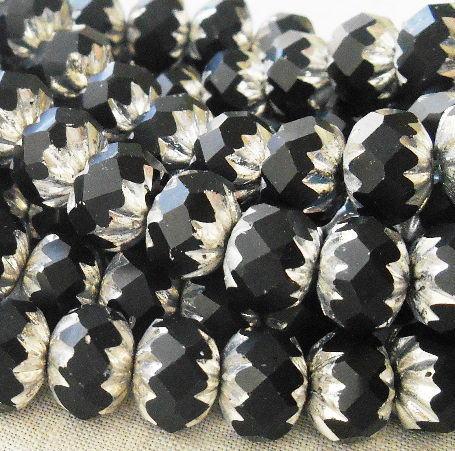 Lot of 25 6 x 9mm opaque black and silver picasso Czech glass faceted cruller beads C58201 - Glorious Glass Beads