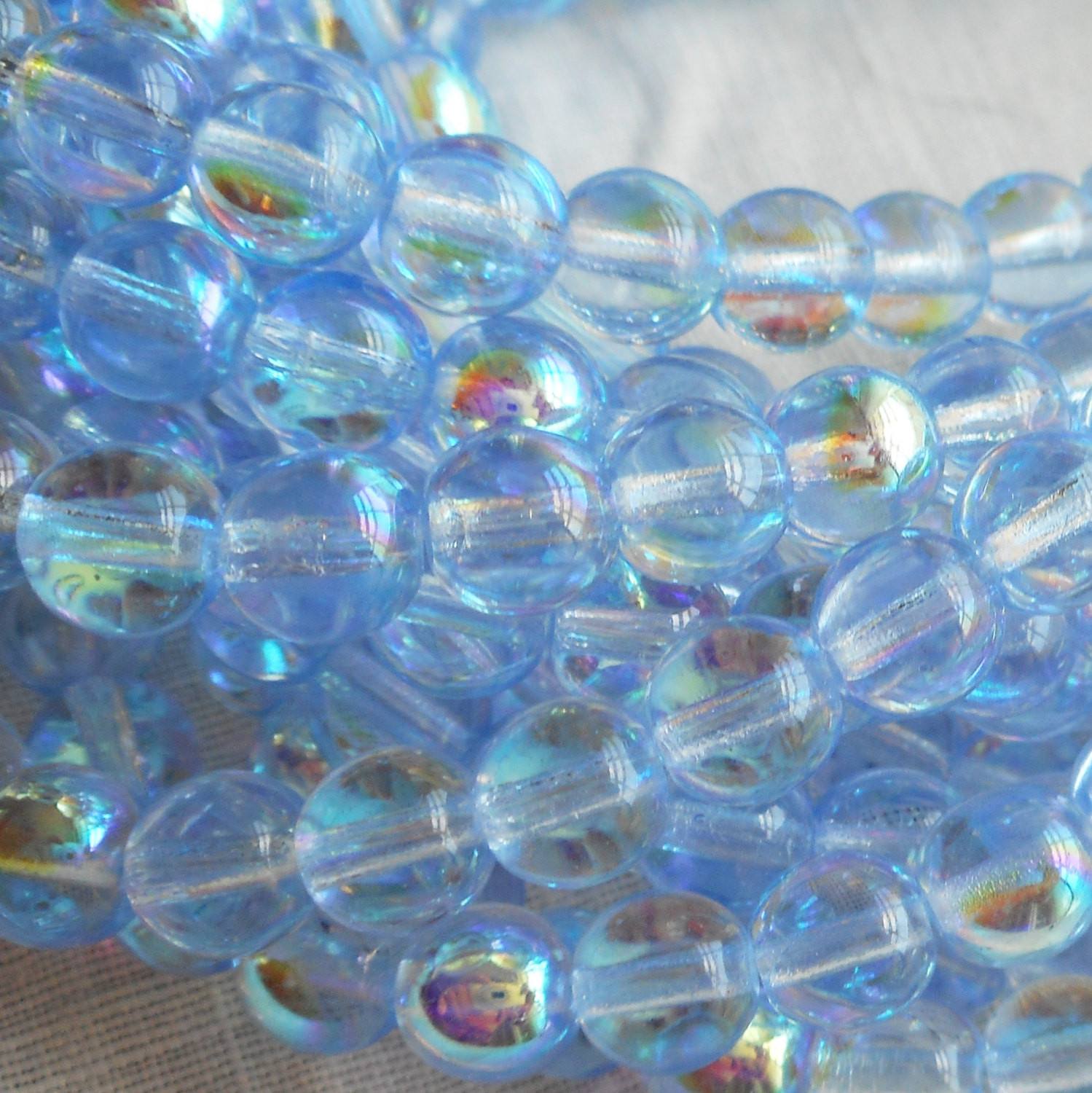 Lot of 50 6mm Czech glass druks, Light Sapphire Blue AB smooth round druk beads C5650 - Glorious Glass Beads