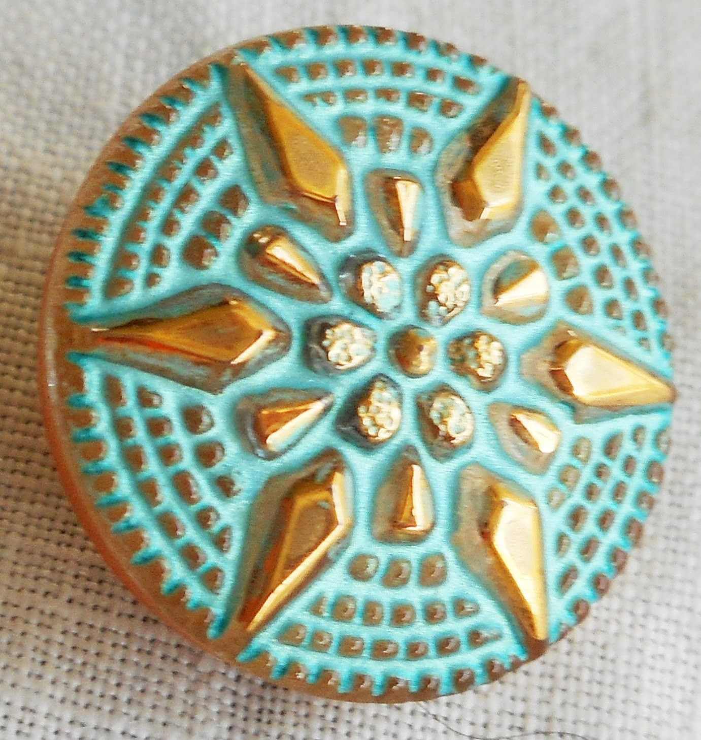 One 18mm Czech glass button, with a gold raised star with a turquoise wash, verdigris look decorative shank button 05201 - Glorious Glass Beads
