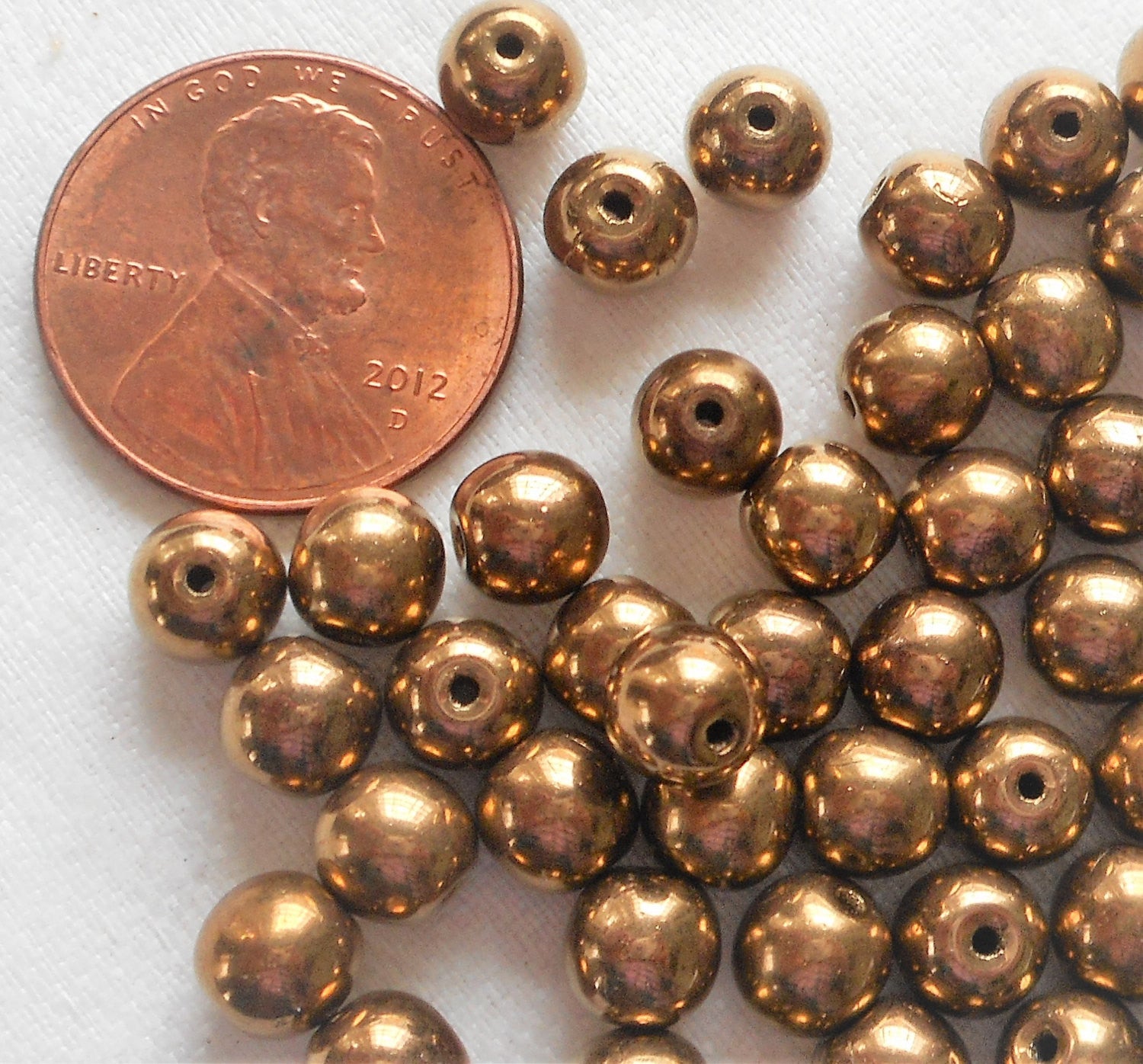 Lot of fifty 6mm Metallic Light Bronze smooth round Czech glass druk beads C3801 - Glorious Glass Beads