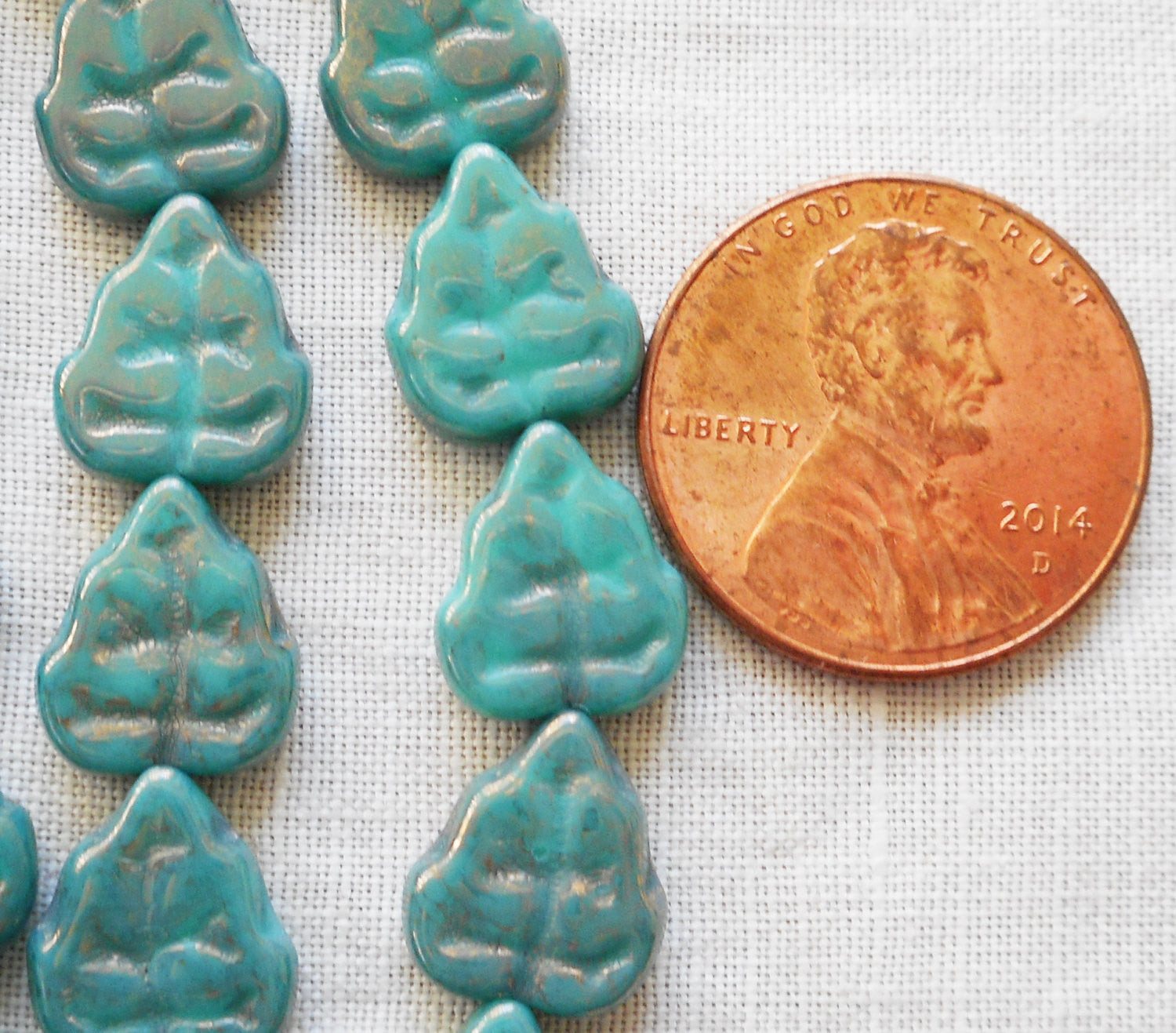 Lot of 25 Czech glass leaf beads, Luster Opaque Turquoise Blue center drilled 8 x 10mm beads C67101 - Glorious Glass Beads