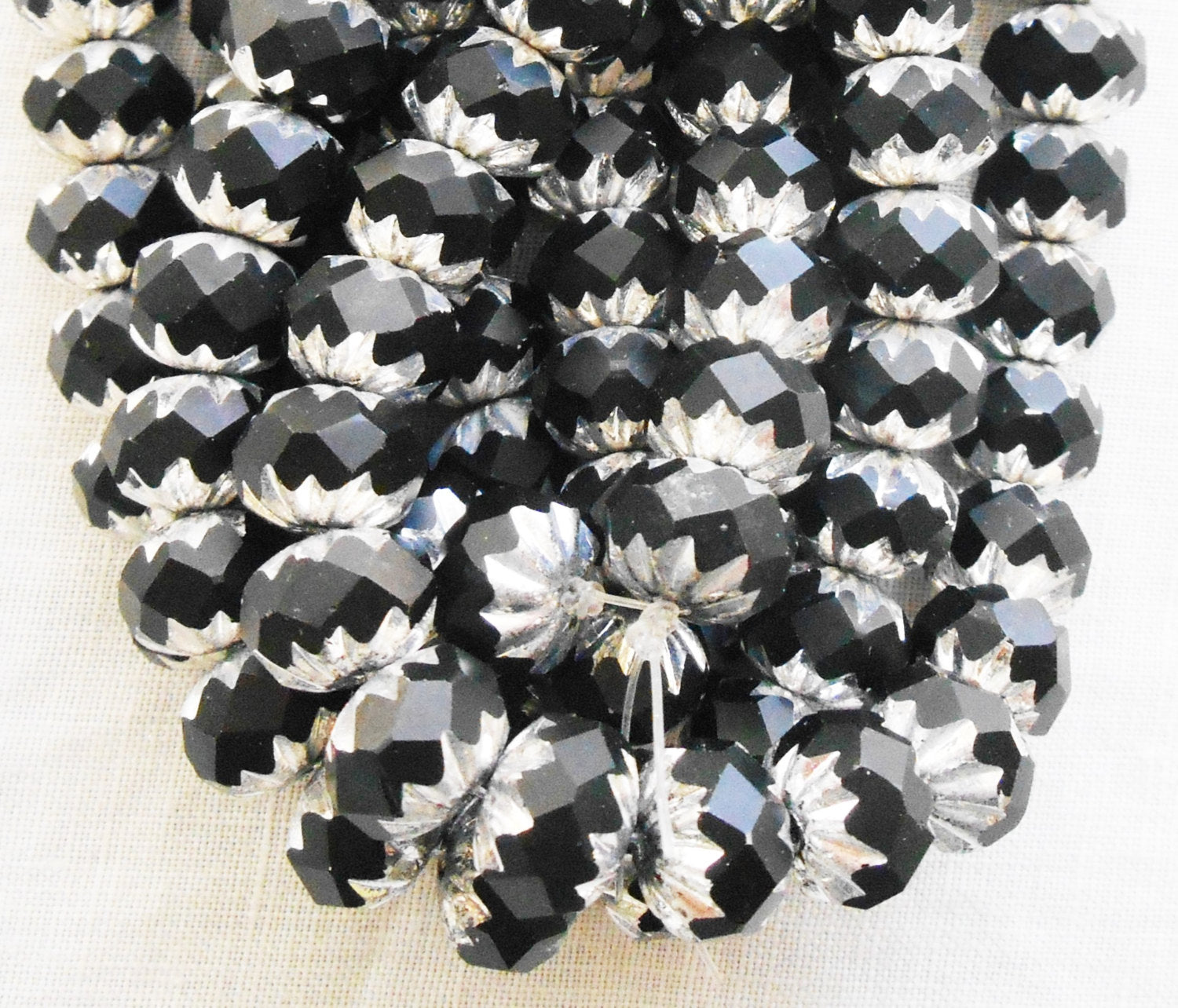 Lot of 25 6 x 9mm opaque black and silver picasso Czech glass faceted cruller beads C58201 - Glorious Glass Beads