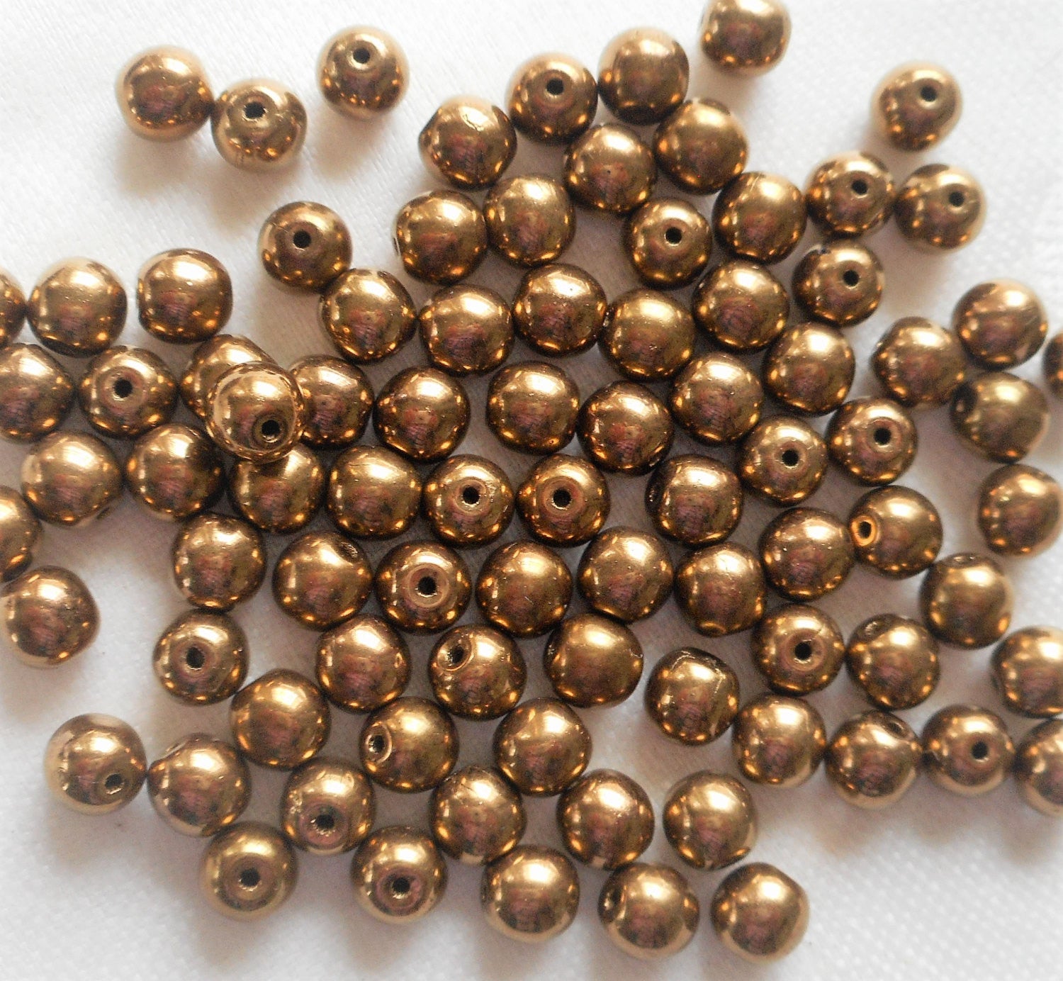 Lot of fifty 6mm Metallic Light Bronze smooth round Czech glass druk beads C3801 - Glorious Glass Beads
