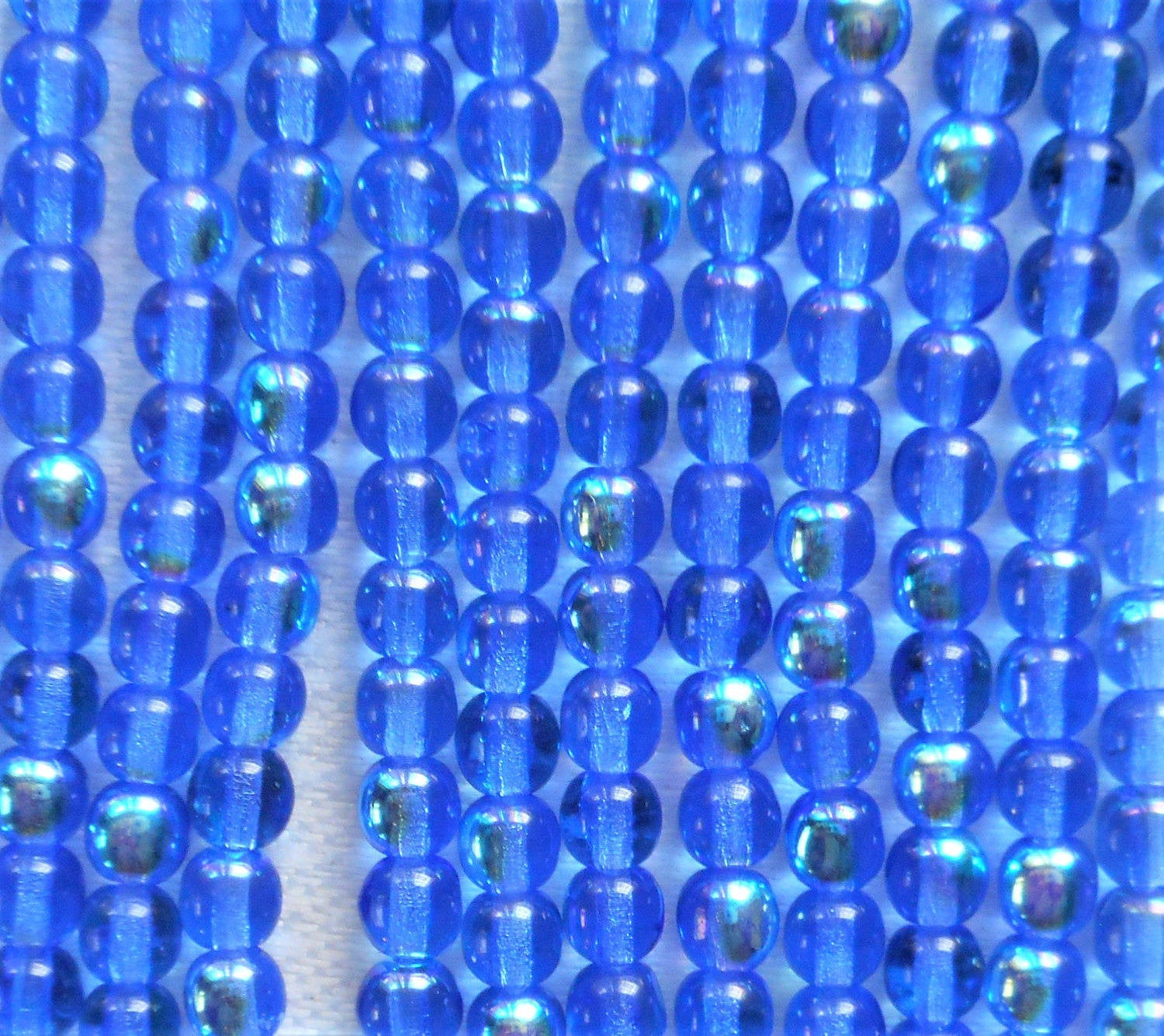 Lot of 100 4mm Sapphire Blue AB Czech glass druk beads, blue AB smooth round druks, C7601 - Glorious Glass Beads