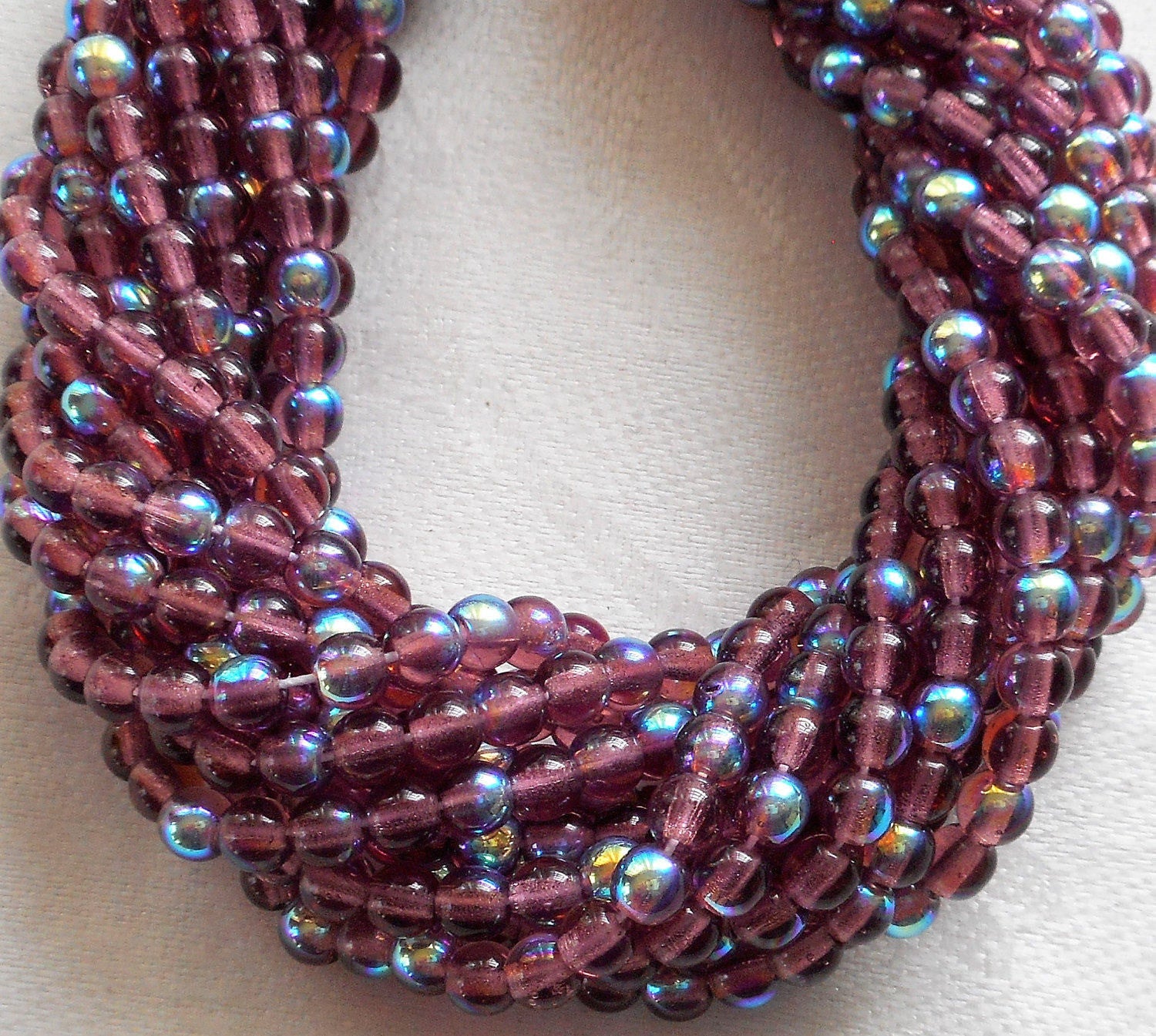 Lot of 100 4mm Amethyst AB Czech glass druk beads, transparent purple AB smooth round druks, C7601 - Glorious Glass Beads