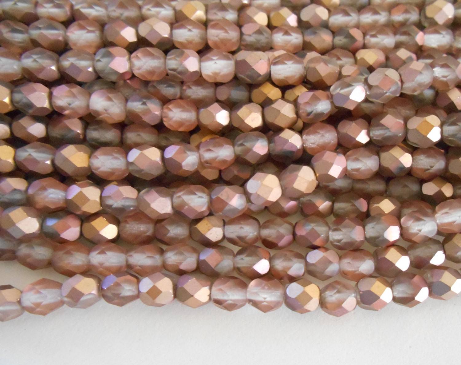 Lot of 25 6mm Matte Apollo Gold Czech glass, firepolished, faceted round beads, C5525 - Glorious Glass Beads