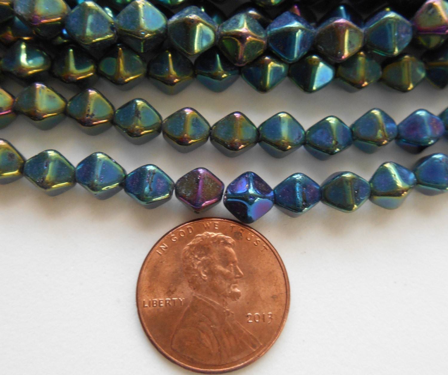 Fifty 6mm metallic Iris Green bicones, Czech pressed glass bicone beads, C3650 - Glorious Glass Beads