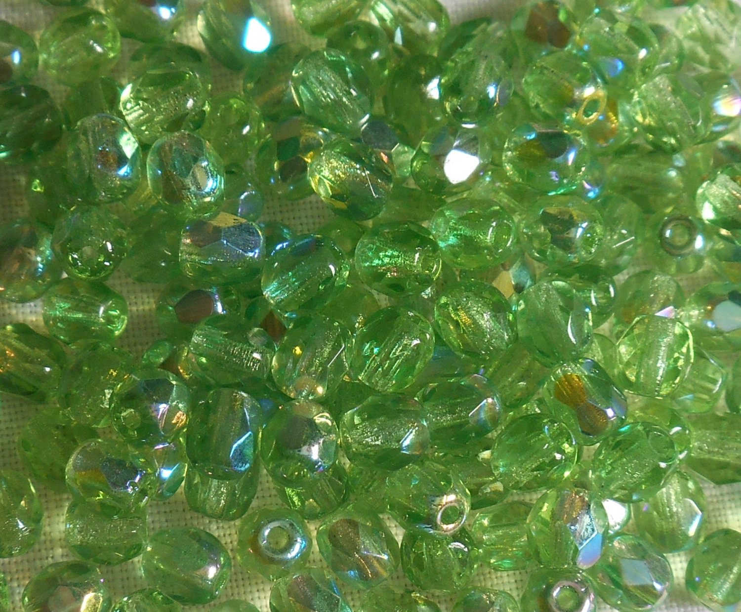 Fifty 4mm Czech Peridot Green AB Glass firepolished faceted round beads, C6350 - Glorious Glass Beads