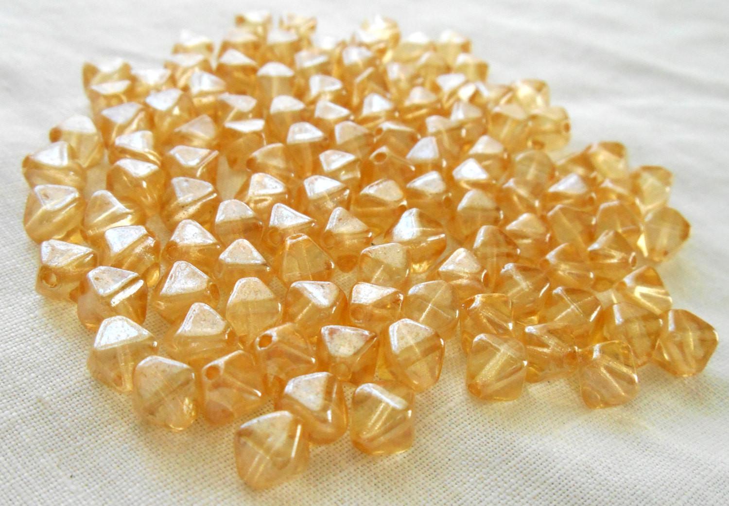 Fifty 6mm Crystal Champagne bicones pressed glass Czech bicone beads, C5350 - Glorious Glass Beads