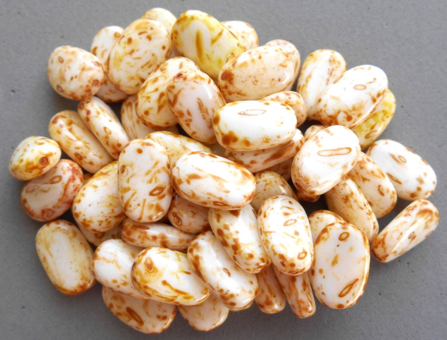 Lot of 25 Butter Pecan White Picasso slightly twisted oval Czech pressed Glass beads, 14mm x 8mm, C3625 - Glorious Glass Beads