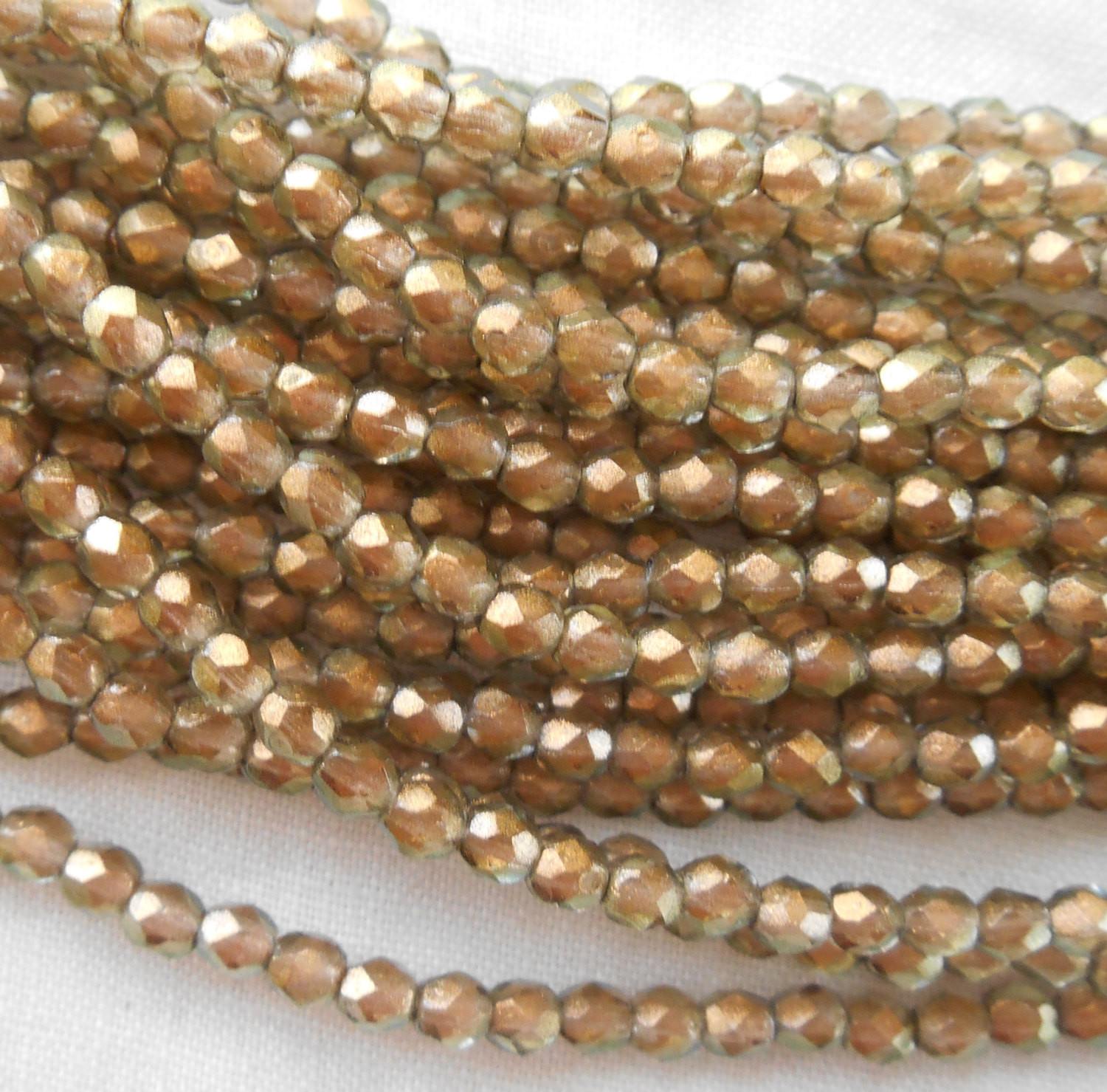 Fifty 3mm Halo Linen Czech Green glass over gold firepolished, faceted round beads, C8625 - Glorious Glass Beads