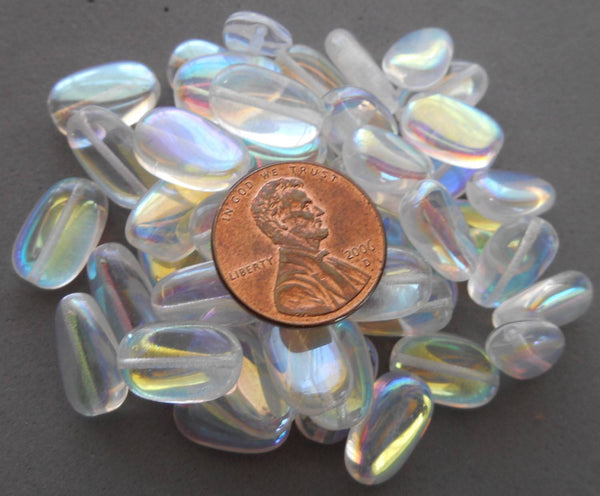 Lot of 25 Crystal AB slightly twisted oval Czech pressed Glass beads, 14mm x 8mm, C8625 - Glorious Glass Beads