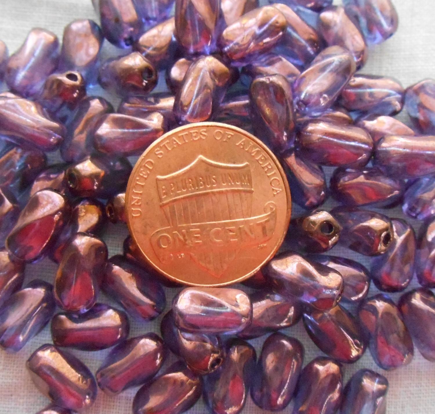 Lot of 25 9mm x 6mm Lumi Amethyst, Purple Czech glass small twisted oval beads, C8825 - Glorious Glass Beads