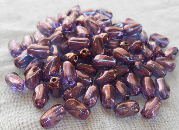 Lot of 25 9mm x 6mm Lumi Amethyst, Purple Czech glass small twisted oval beads, C8825 - Glorious Glass Beads