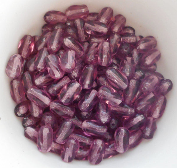 Lot of 25 9mm x 6mm light Amethyst, Purple Czech glass twisted oval beads, C5625