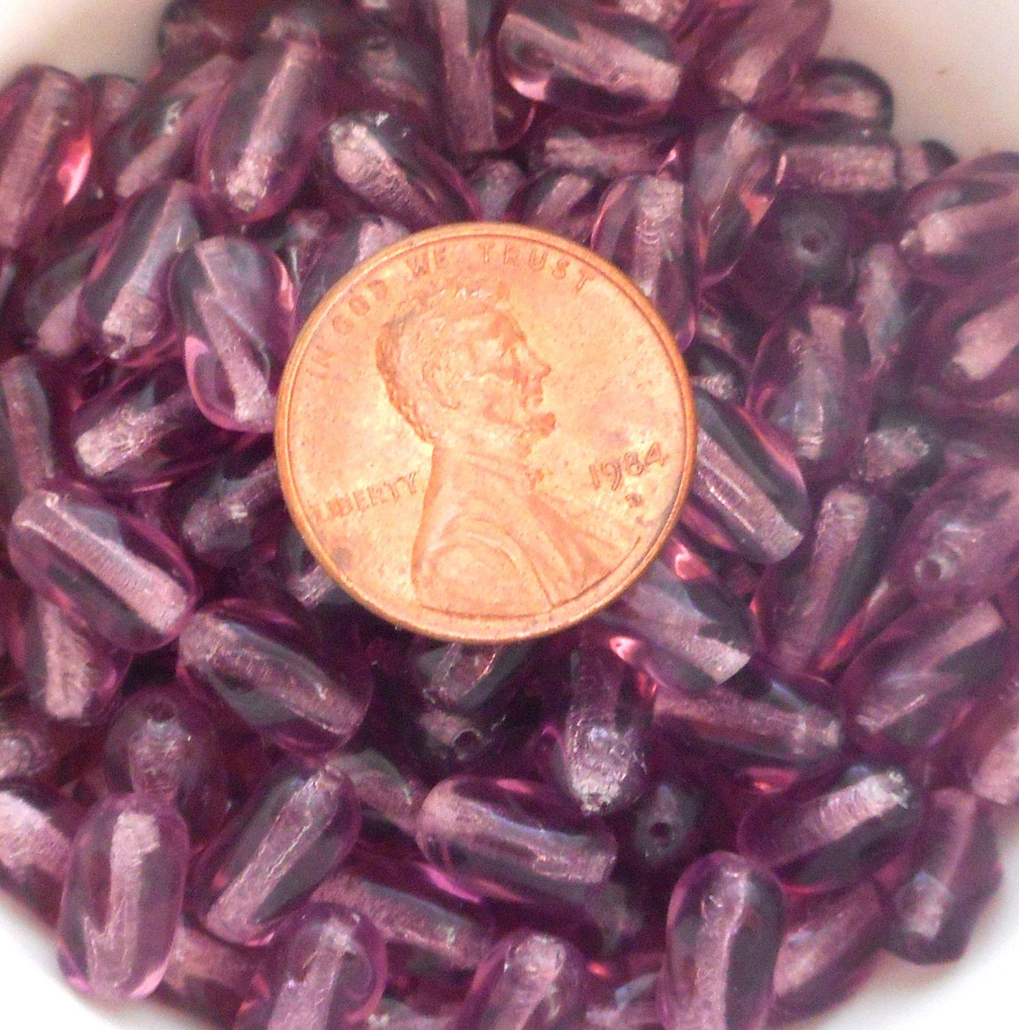 Lot of 25 9mm x 6mm light Amethyst, Purple Czech glass twisted oval beads, C5625 - Glorious Glass Beads