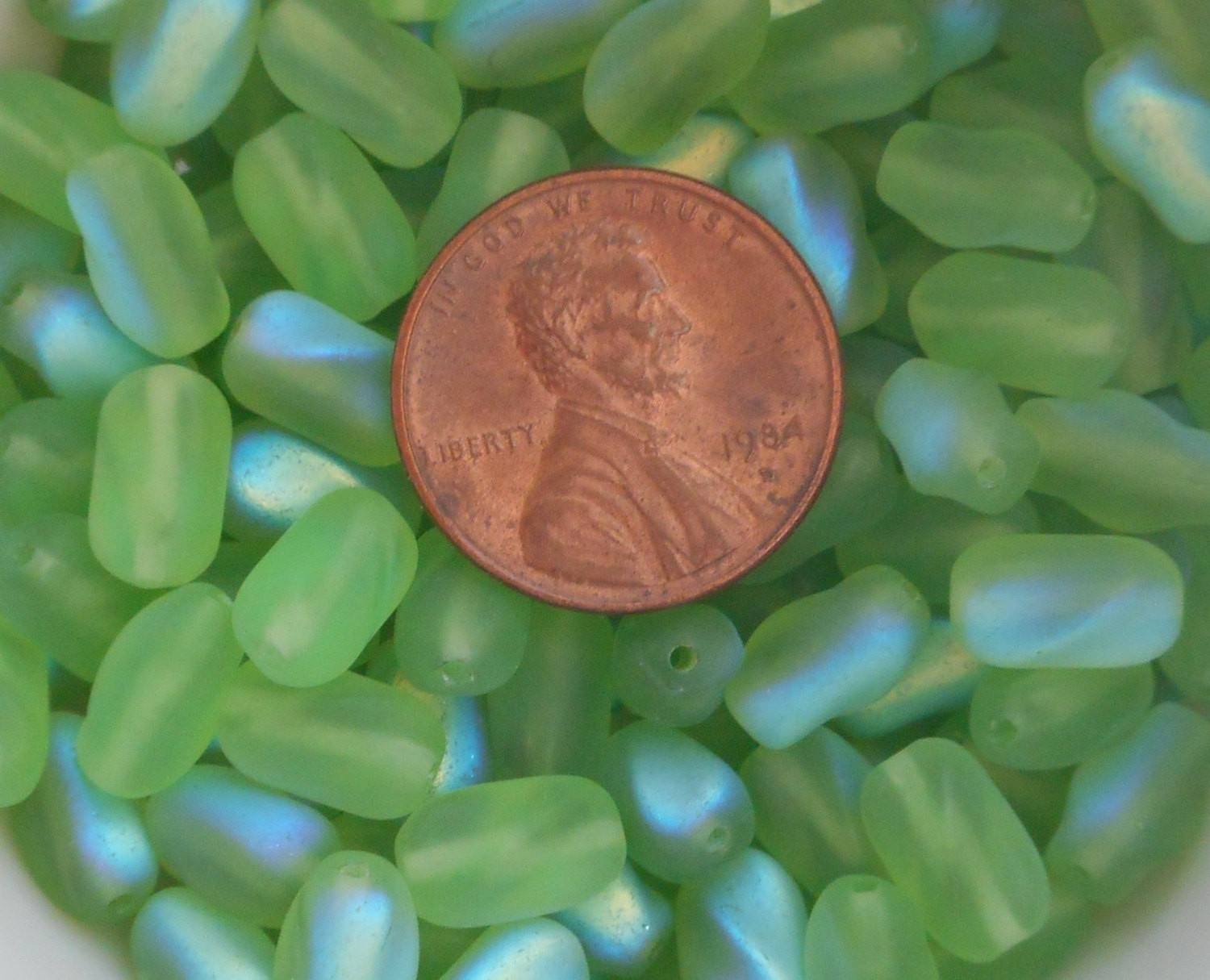 Lot of 25 9mm x 6mm Frosted Peridot Lime Green AB glass twisted oval beads, C2325 - Glorious Glass Beads